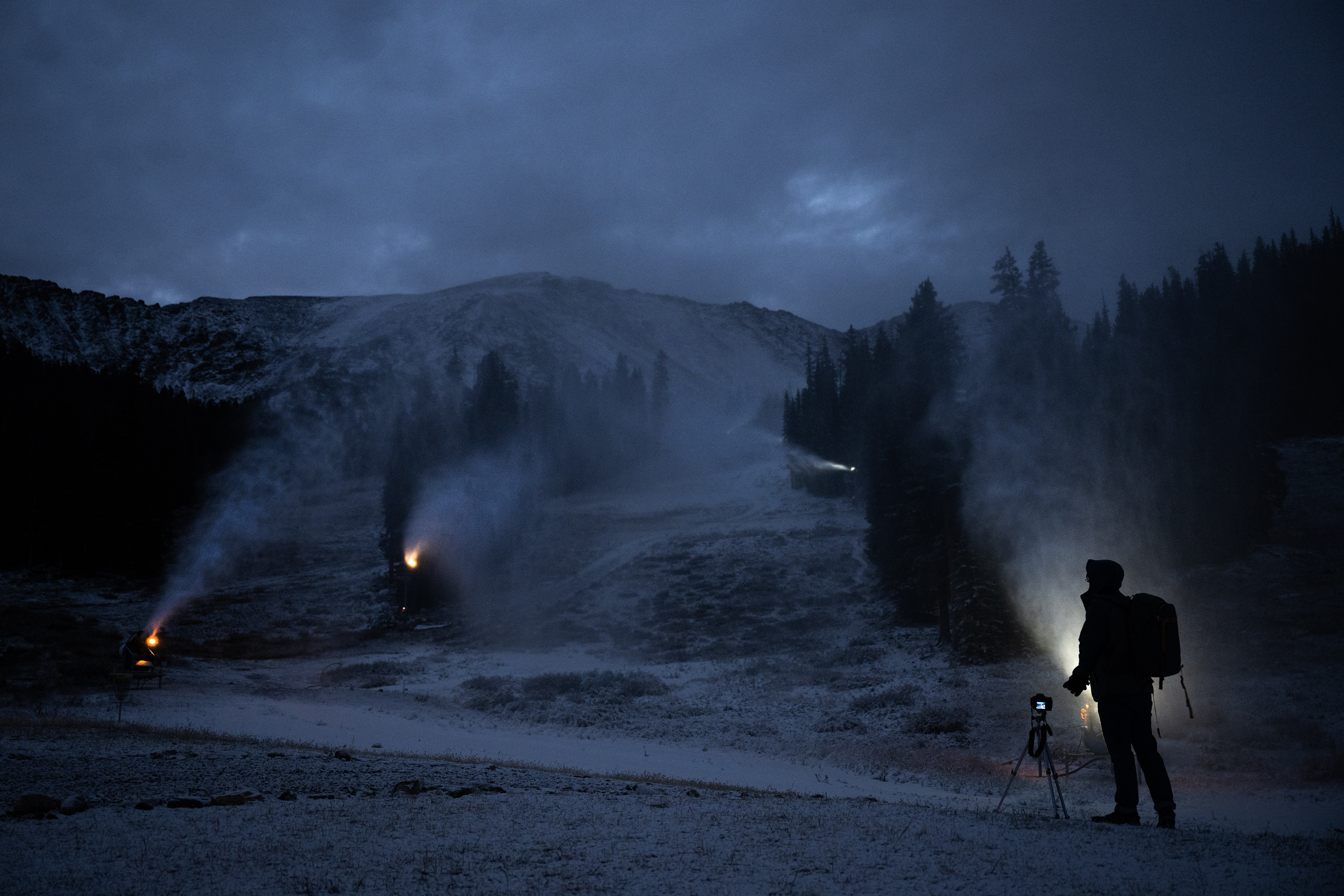 Denver Gazette multimedia editor Tom Hellauer sets up a camera to get footage of snow guns blowing on the High Noon ski run on Wednesday, Oct. 4, 2023, at Arapahoe Basin Ski Area in Summit County, Colo. (Timothy Hurst/Denver Gazette) (TimHursttim.hurst@gazette.comhttps://secure.gravatar.com/avatar/aca82bd62b4ee425c598527cd6faa1b1?d=mm&r=g)