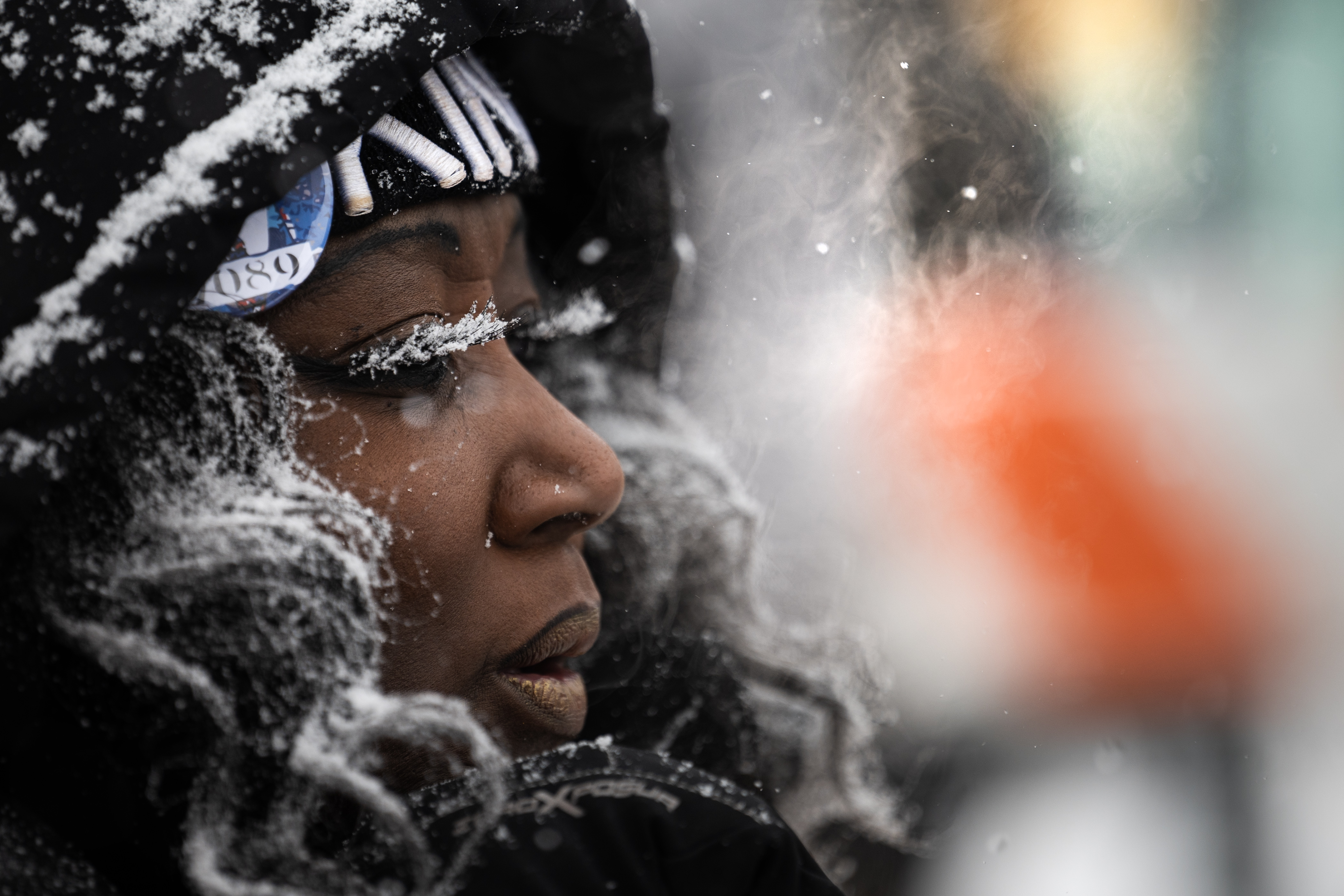 Snow clings to Bridget Johnson’s eyelashes as she hold a large clock with a photo of Dr. Martin Luther King Jr. before the step-off of Denver's annual Dr. Martin Luther King Jr. Day marade on Monday, Jan. 15, 2024, in Denver, Colo.(Timothy Hurst/Denver Gazette) (TimHursttim.hurst@gazette.comhttps://secure.gravatar.com/avatar/aca82bd62b4ee425c598527cd6faa1b1?d=mm&r=g)