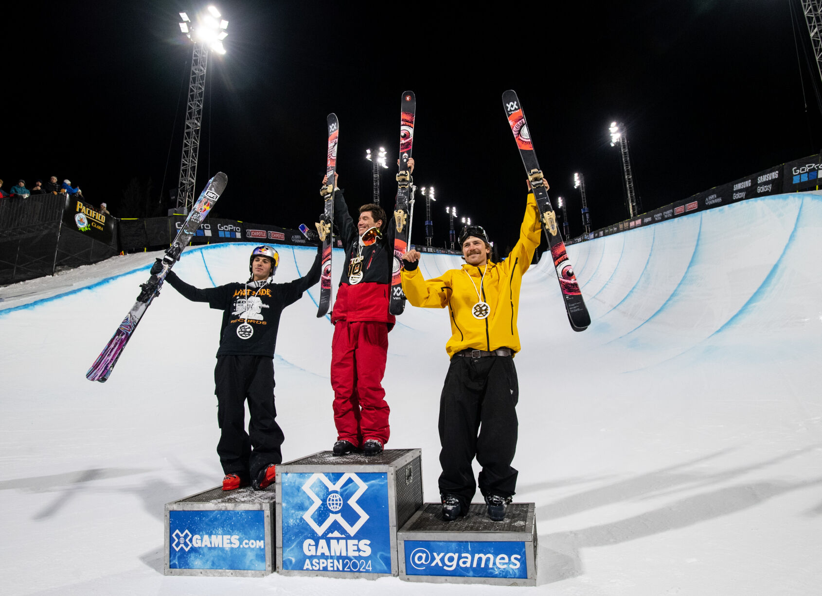 Chipotle Men’s Ski Superpipe gold medalist Alex Ferreira, center, silver medalist Nico Porteous, left, and bronze medalist Hunter Hess pose on the podium at the base of the superpipe at the X Games on Sunday, Jan. 28, 2024, in Aspen, Colo. The X Games wrapped Sunday after three days of competition. (Parker Seibold, The Gazette) (Parker Seibold)