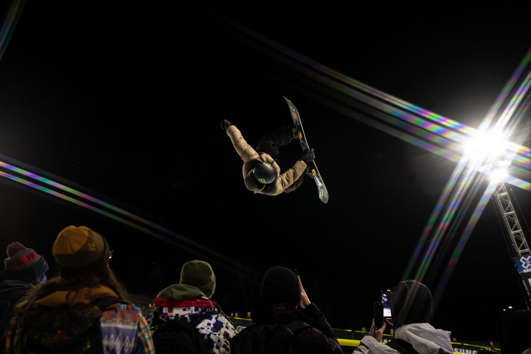 Kaishu Hairano of Japan flies over the crowd as he competes in the Monster Energy Men’s Snowboard SuperPipe Final on day 1 of the X Games Aspen 2024 on January 26, 2024 in Aspen, Colo. (Parker Seibold, The Gazette) (Parker Seibold)