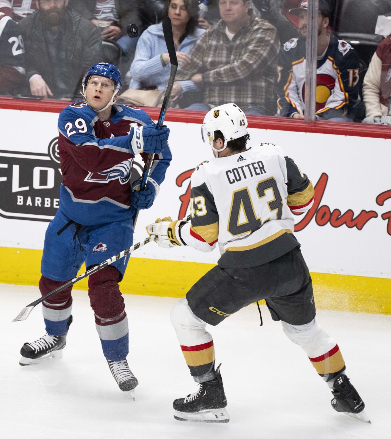 Colorado Avalanche center Nathan MacKinnon (29) watches the puck as it falls back to the ice while Vegas Golden Knights center Paul Cotter (43) defends during the third period Wednesday, Jan. 10, 2024, at Ball Arena in Denver. (The Gazette, Christian Murdock) (Christian Murdock/The Gazette)