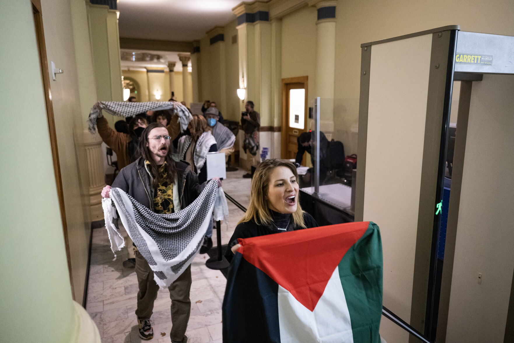 A group of pro-Palestinian protesters are lead out of the basement of the Colorado State Capitol building after protesting from the gallery of the Colorado House of Representatives chambers during the first day of Colorado's 2024 legislative session on Wednesday, Jan. 10, 2024, in Denver, Colo.(Timothy Hurst/Denver Gazette) (TimHursttim.hurst@gazette.comhttps://secure.gravatar.com/avatar/aca82bd62b4ee425c598527cd6faa1b1?d=mm&r=g)
