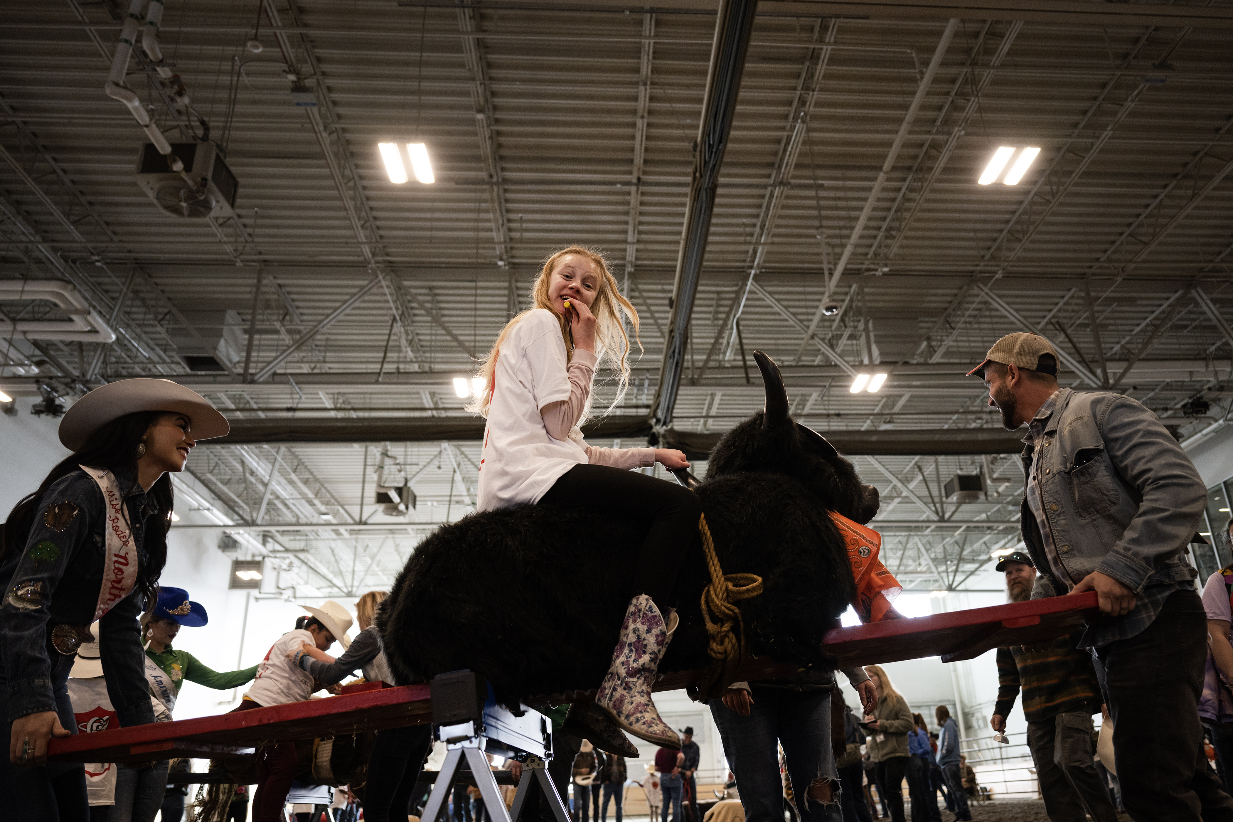 Grace Junjerman, 16, enjoys riding a bucking bull during the annual PRCA Exceptional Rodeo on Thursday, Jan. 18, 2024, at the Temple Grandin Equine Center at Colorado State University Spur in Denver, Colo.(Timothy Hurst/Denver Gazette) (TimHursttim.hurst@gazette.comhttps://secure.gravatar.com/avatar/aca82bd62b4ee425c598527cd6faa1b1?d=mm&r=g)