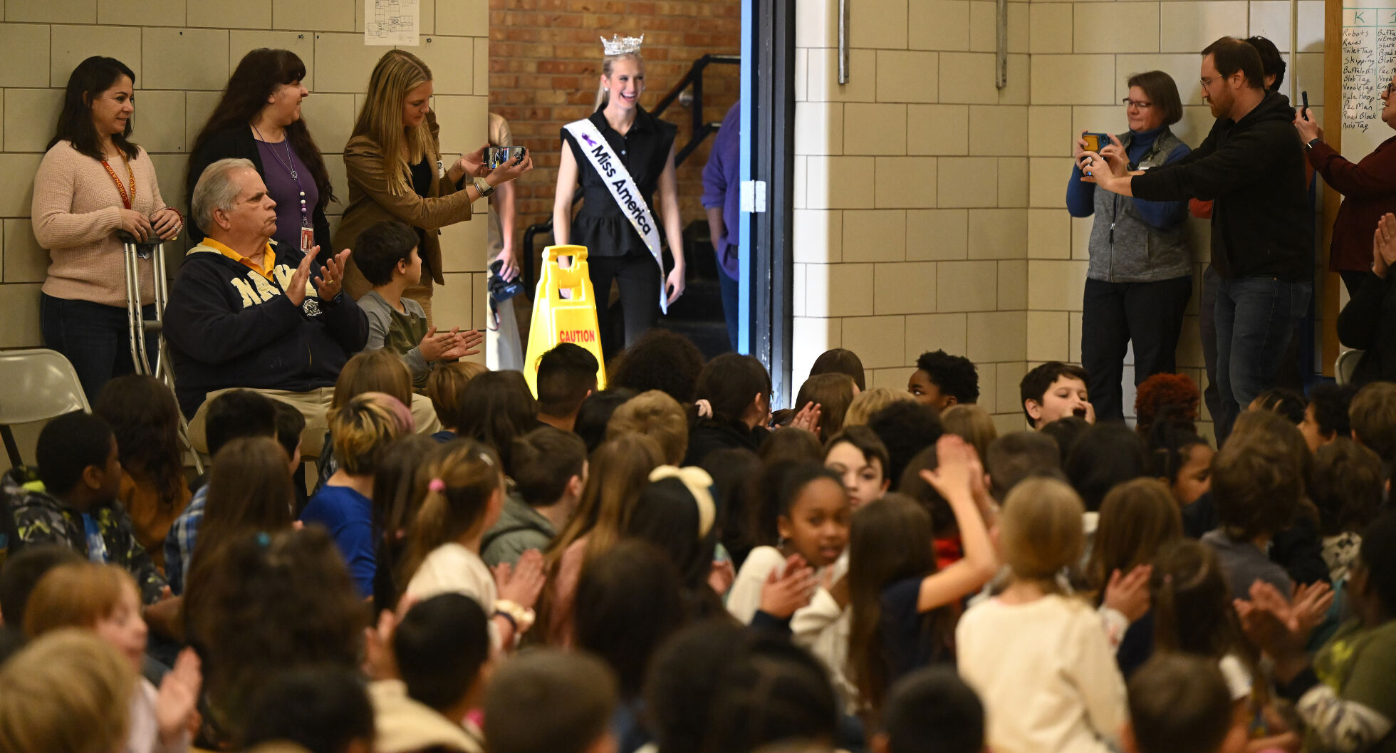 Miss America Madison Marsh enters an assembly at Jackson Elementary School on Wednesday, Jan. 24, 2024. (Photo by Jerilee Bennett, The Gazette)