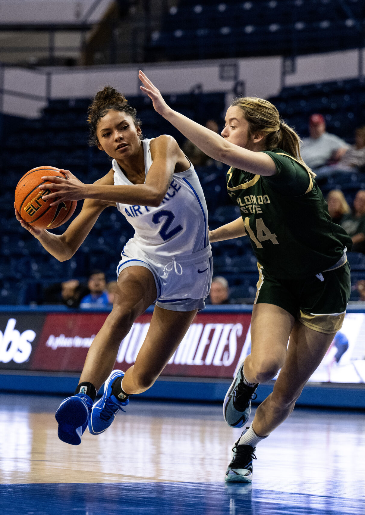 Air Force guard Milahnie Perry (2) is defended by Colorado State University guard Marta Leimane (14) in the second half of a NCAA basketball game on Wednesday, Jan. 31, 2024, at Air Force Academy, Colo. The Falcon’s won 59-49. (Parker Seibold, The Gazette) (Parker Seibold)