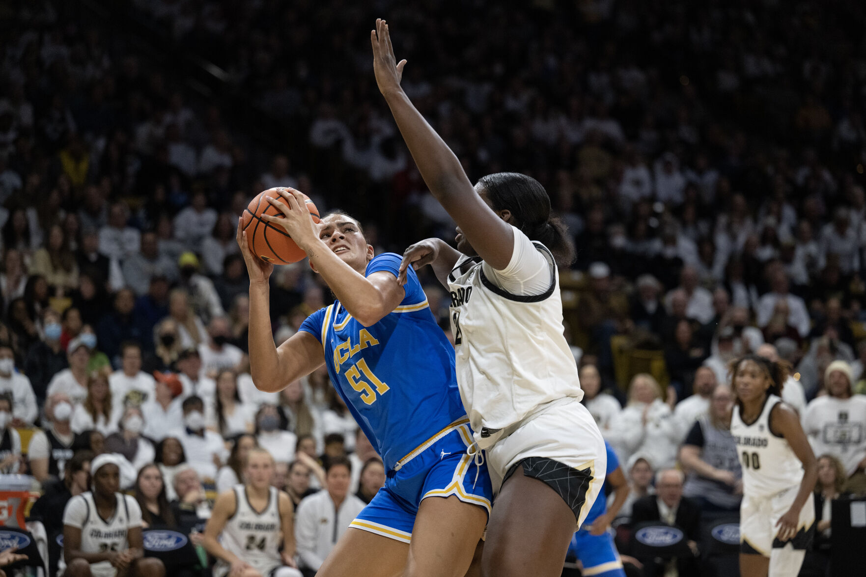 UCLA Bruins center Lauren Betts (51) looks for a shot past Colorado Buffaloes center Aaronette Vonleh (21) on Friday, Jan. 19, 2024, at the CU Event Center in Boulder, Colo.(Timothy Hurst/Denver Gazette) (TimHursttim.hurst@gazette.comhttps://secure.gravatar.com/avatar/aca82bd62b4ee425c598527cd6faa1b1?d=mm&r=g)