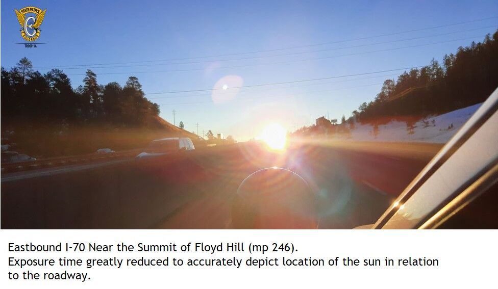 Morning sun glares in the eyes of eastbound motorists on Interstate 70 on Floyd Hill west of Denver on sunny days November through February, resulting in a safety closure of the highway and traffic diversion by CDOT and the Colorado State Patrol for an hour or more. (Courtesy of Sgt. Maj. Don Enloe — Colorado State Patrol)