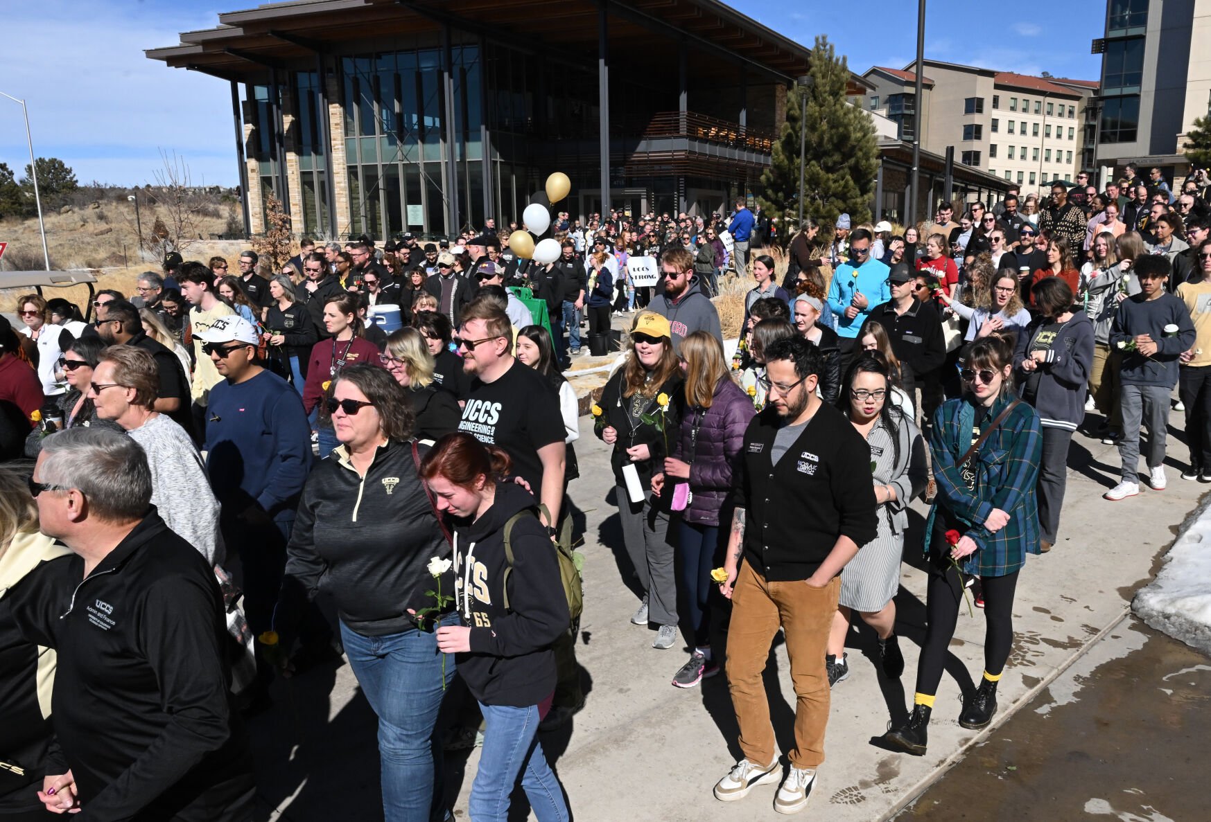 Hundreds start out on a Healing Walk at UCCS on Monday, Feb. 19, 2024. Two people were found dead in a dorm last Friday of apparent gunshot wounds. A suspect was arrested Monday. Also, a student suddenly died from a medical issue several days before the murders. (Photo by Jerilee Bennett, The Gazette)