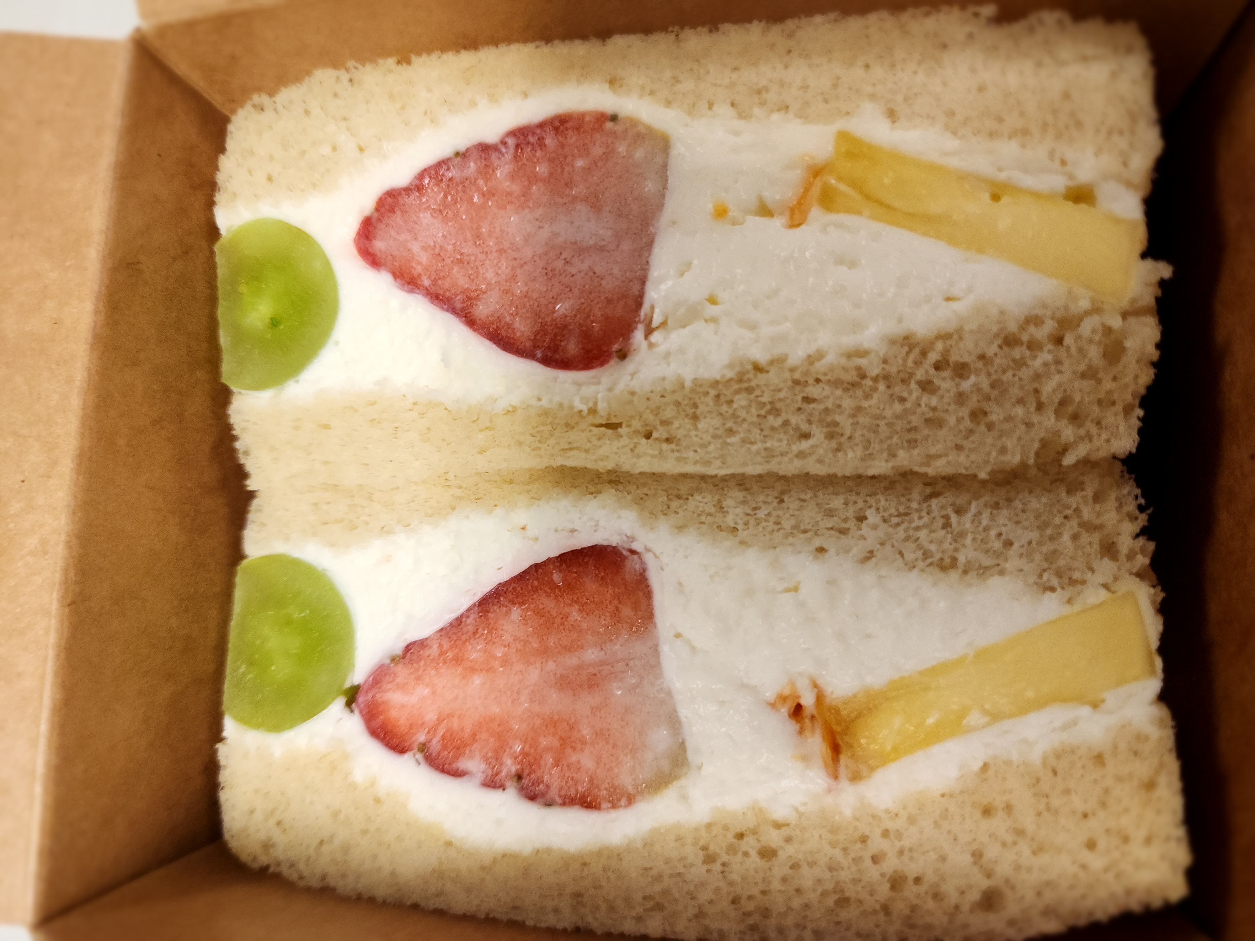 Sandoitchi offers sandwiches in both savory and sweet options, like this fruit crème sandwich with fresh strawberries, pineapple, grapes and mandarin. RiNo’s Zeppelin station is once again hosting Japanese sandwich pop-up Sandoitchi, which will be open until Saturday. (Marco Cummings/Denver Gazette)