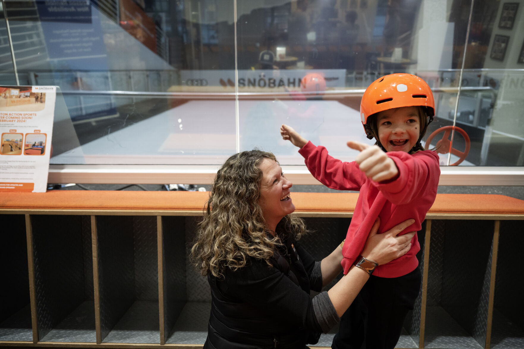 First-time skier Quinn Leensvaart, 7, gives her enthusiastic approval of her first lesson on the artificial slopes to her mother Mandy Leensvaart on Wednesday, Jan. 24, 2024, at SNÖBAHN Indoor Ski + Snowboard Center in Centennial. (TimHursttim.hurst@gazette.comhttps://secure.gravatar.com/avatar/aca82bd62b4ee425c598527cd6faa1b1?d=mm&r=g)