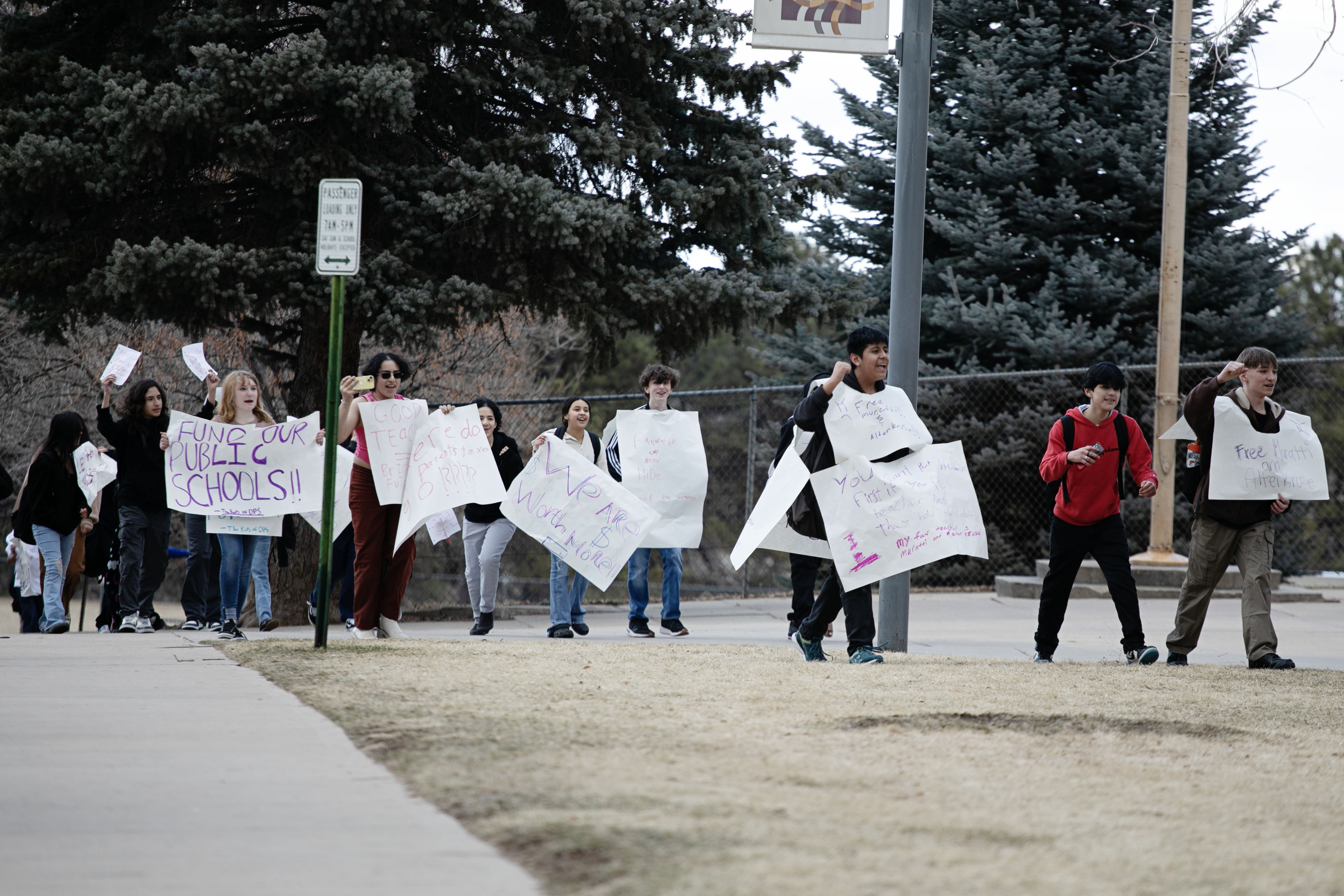An estimated 100 students of Kunsmiller Creative Arts Academy staged a walkout in protest of impending layoffs affecting several of the school's educators and walked around the campus grounds on Thursday, Feb. 22, 2024. Students chanted, 