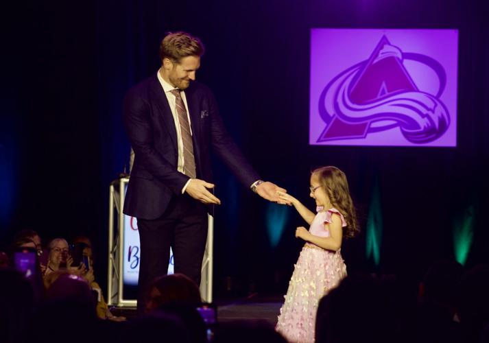 Gabriel Landeskog walks the runway with Isabell
