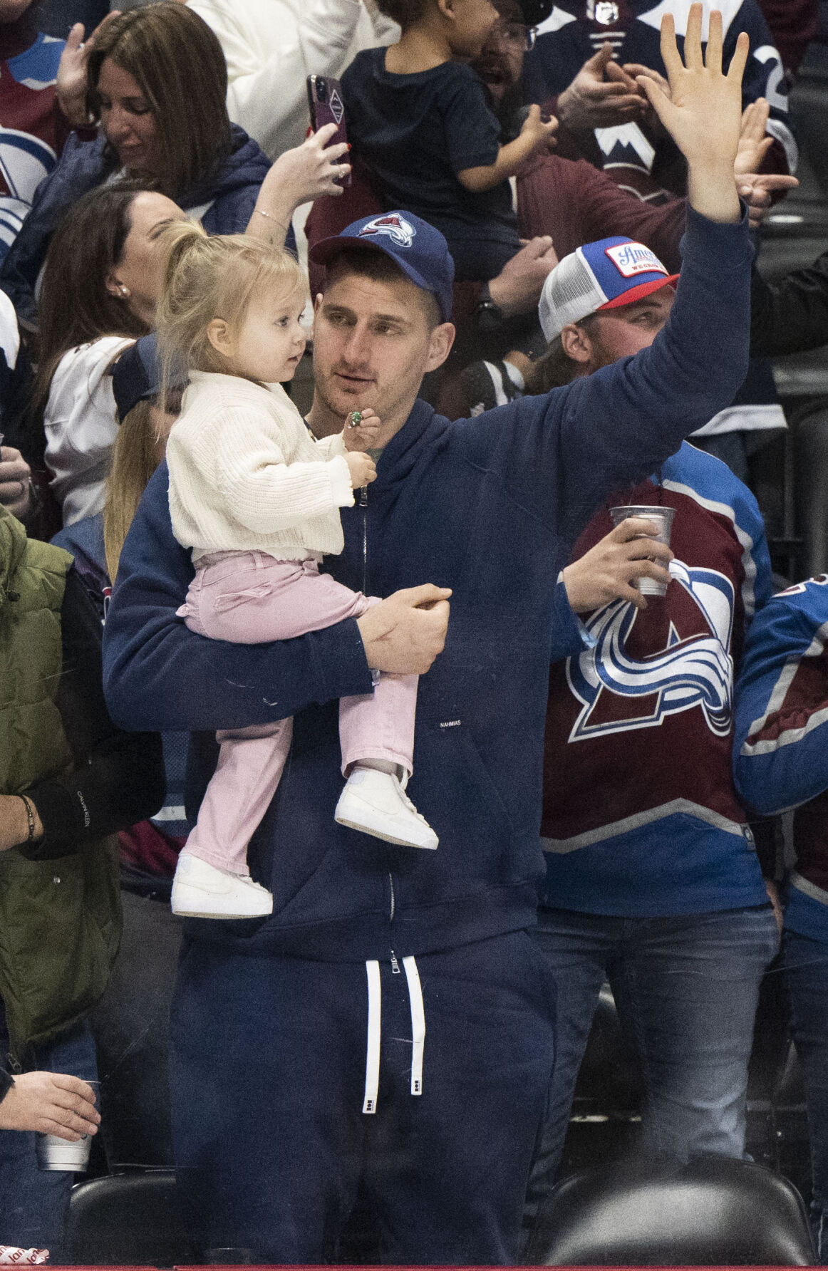 Nuggets MVP center Nikola Jokec cheers with his daughter, Ognjena, 2, after the Avalanche scored during the third period against the Vancouver Canucks Tuesday, Feb. 20, 2024, at Ball Arena in Denver. (The Gazette, Christian Murdock) (Christian Murdock/The Gazette)