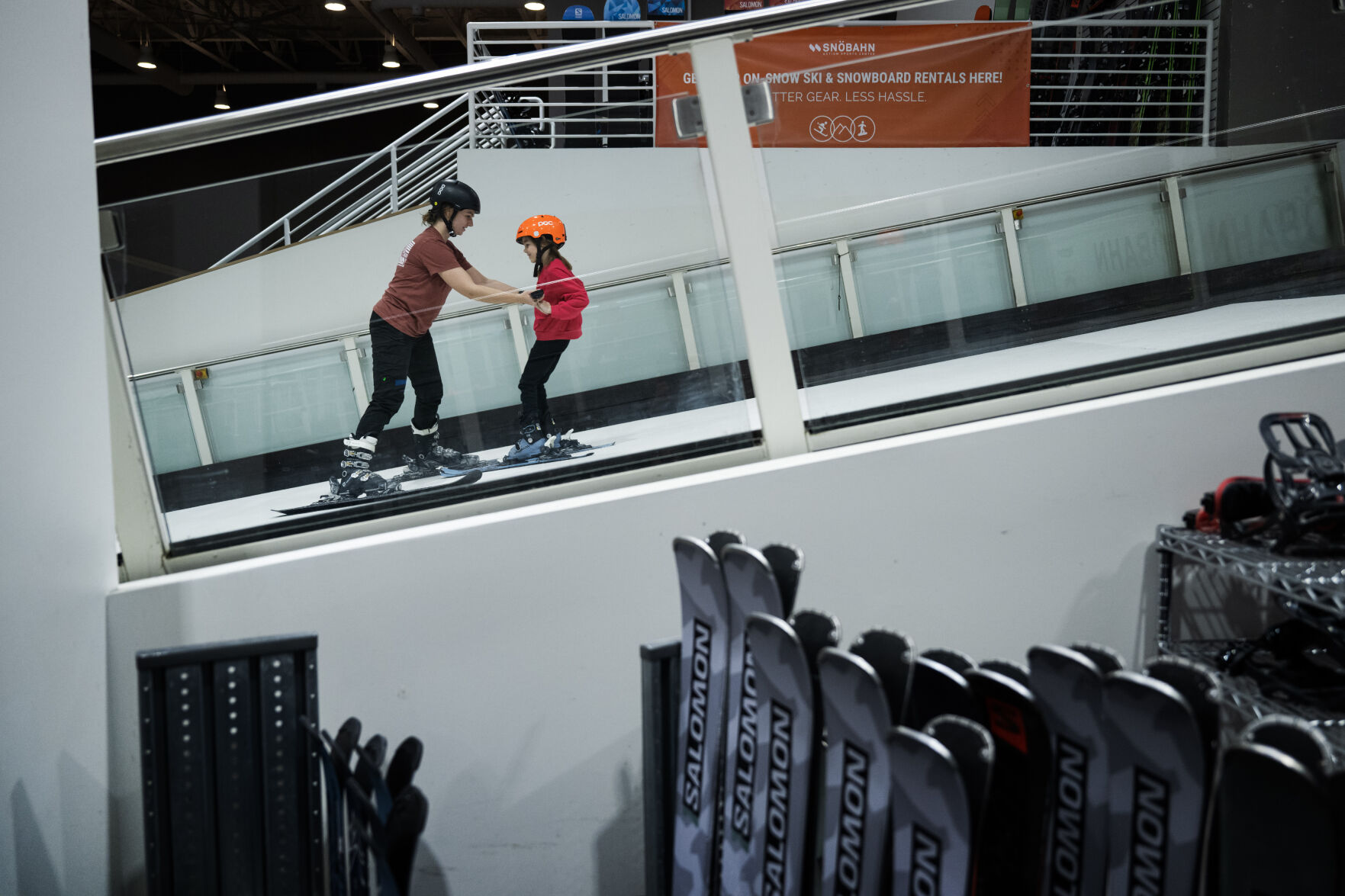 Training manager and instructor Mary Davis, helps first-time skier Quinn Leensvaart, 7, slowly descend down the artificial ski slope during a lesson on one of the three indoor slopes on Wednesday, Jan. 24, 2024, at SNÖBAHN Indoor Ski + Snowboard Center in Centennial. (TimHursttim.hurst@gazette.comhttps://secure.gravatar.com/avatar/aca82bd62b4ee425c598527cd6faa1b1?d=mm&r=g)