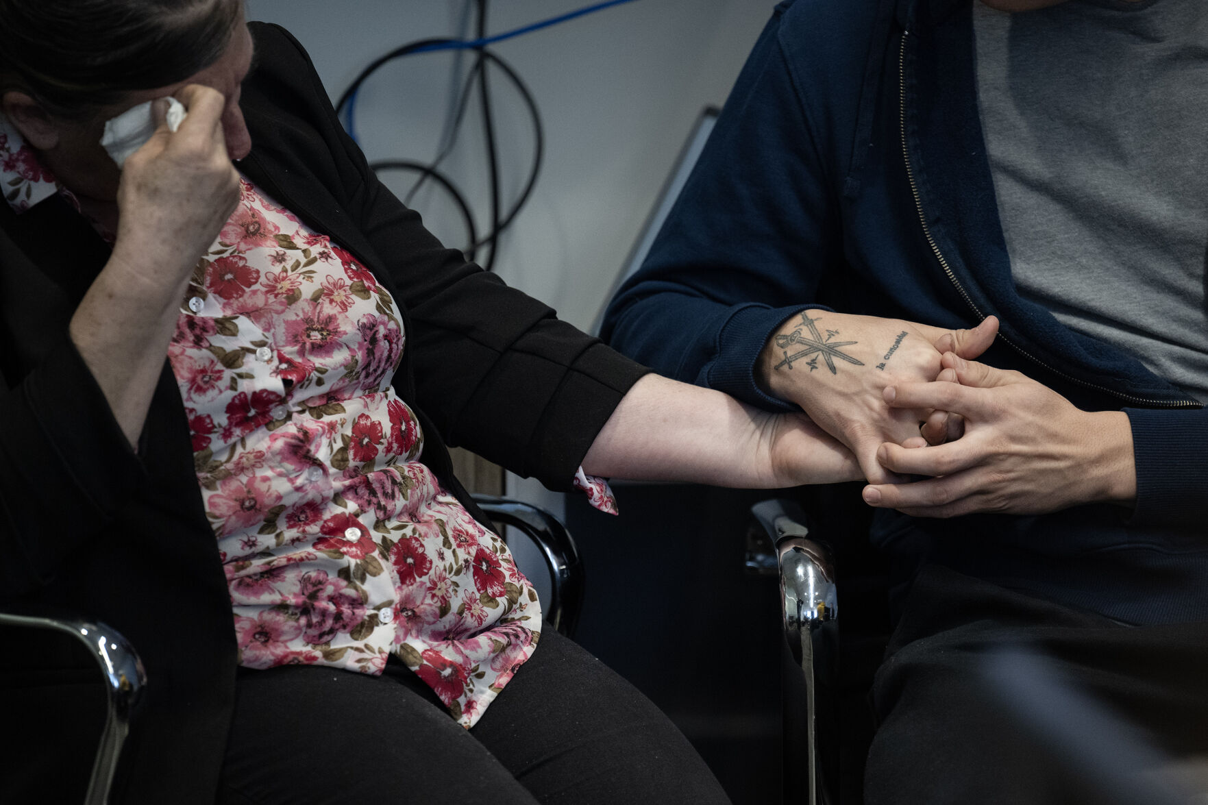 Criselda Bobadilla Sandoval, the mother of Luis Garcia, who was shot on February 13th of 2023 in front of East High School and died two weeks later from his injuries, is comforted by Garcia’s brother Santos Garcia during a press conference at the Barringer Law Firm office on Tuesday, Feb. 13, 2024, in Greenwood Village, Colo. (Timothy Hurst/Denver Gazette) (TimHursttim.hurst@gazette.comhttps://secure.gravatar.com/avatar/aca82bd62b4ee425c598527cd6faa1b1?d=mm&r=g)