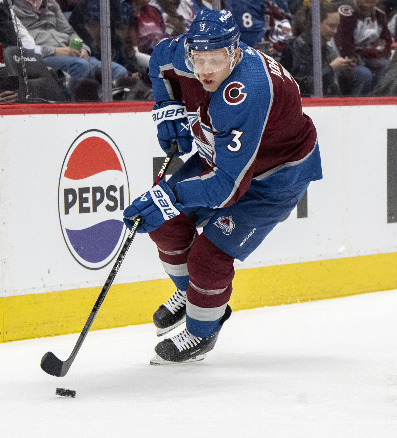Colorado Avalanche defenseman Jack Johnson (3) moves the puck behind the goal during the second period against the Vancouver Canucks Tuesday, Feb. 20, 2024, at Ball Arena in Denver. (The Gazette, Christian Murdock) (Christian Murdock/The Gazette)