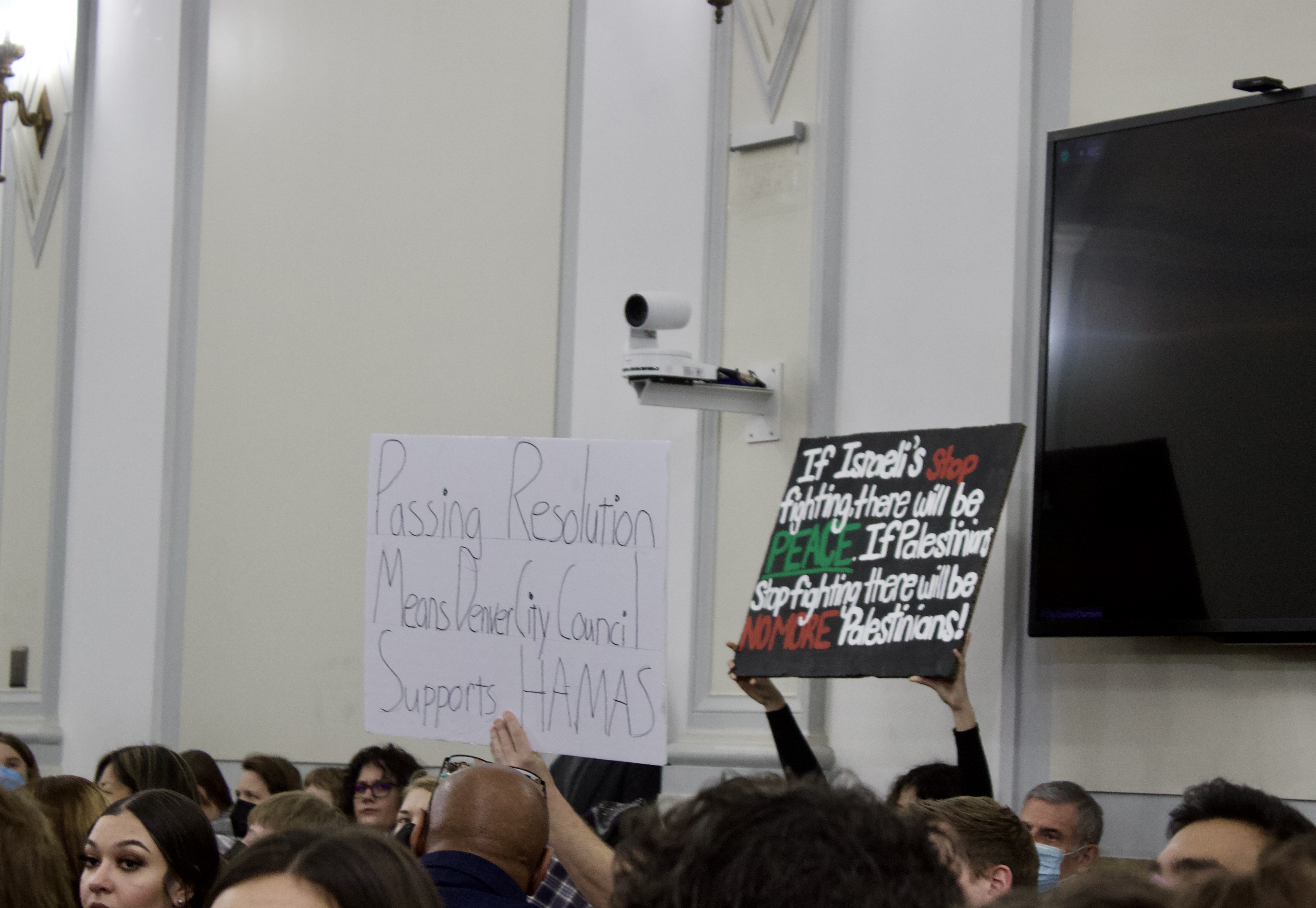 Supporters and critics of Denver City Council's proclamation calling for a cease-fire in the Israel-Hamas war holding up signs to council members during its discussion of the conflict on Monday, Feb. 12 at the Denver City and County building. (NoahFestensteinCity Government Reporternoah.festenstein@denvergazette.comhttps://denvergazette.com/content/tncms/avatars/9/f0/326/9f032698-379f-11ee-8053-8bacbed4931f.60984dba383441d9647e0e740a08a8e6.png)