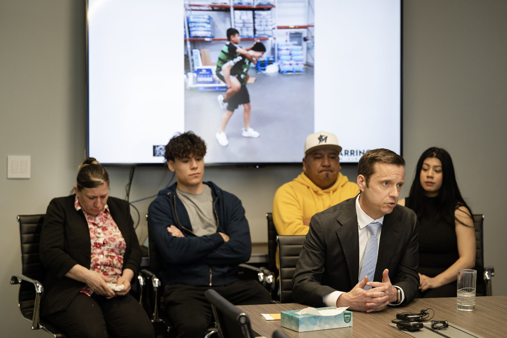 Matthew Barringer, center, who is representing the family of Luis Garcia, who was shot on February 13th of 2023 in front of East High School and died two weeks later from his injuries, speaks to media during a press conference at the Barringer Law Firm office on Tuesday, Feb. 13, 2024, in Greenwood Village, Colo. (Timothy Hurst/Denver Gazette) (TimHursttim.hurst@gazette.comhttps://secure.gravatar.com/avatar/aca82bd62b4ee425c598527cd6faa1b1?d=mm&r=g)