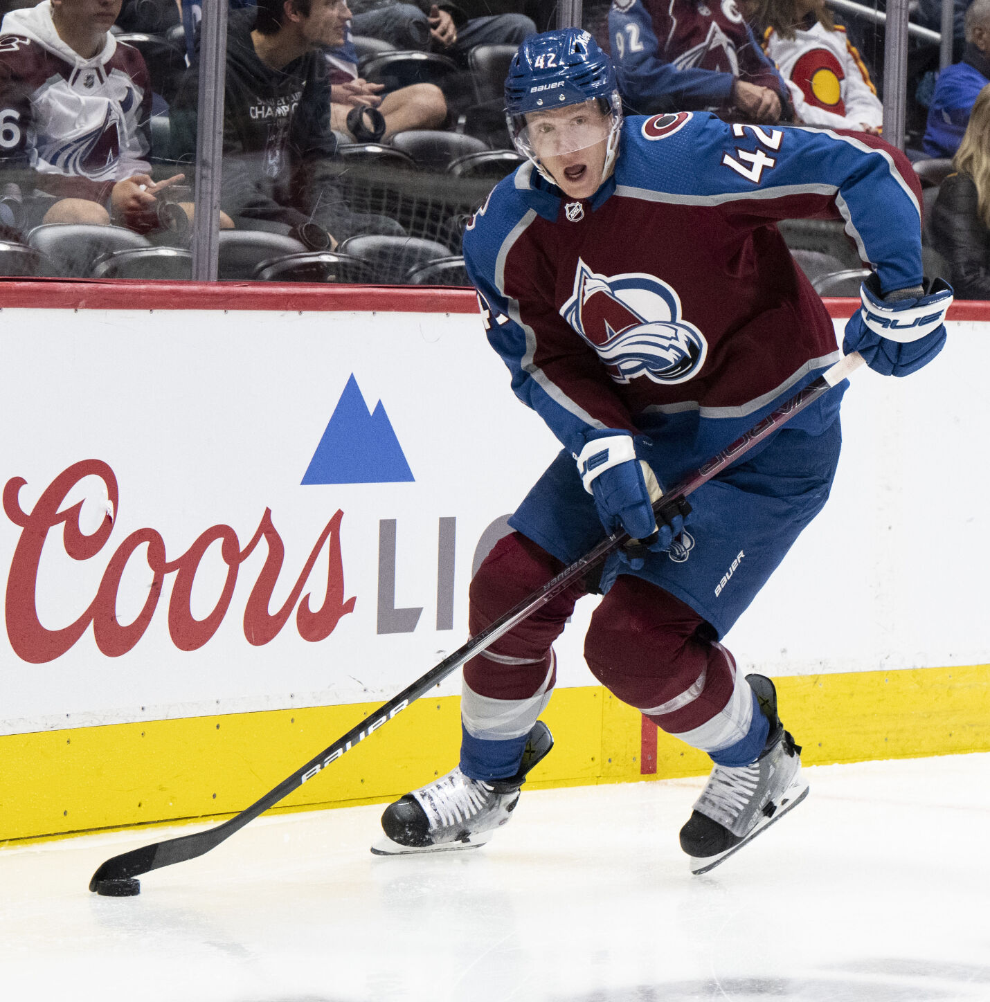 Colorado Avalanche defenseman Josh Manson (42) moves the puck behind the Avs goal during the second period against the Vancouver Canucks Tuesday, Feb. 20, 2024, at Ball Arena in Denver. (The Gazette, Christian Murdock) (Christian Murdock/The Gazette)