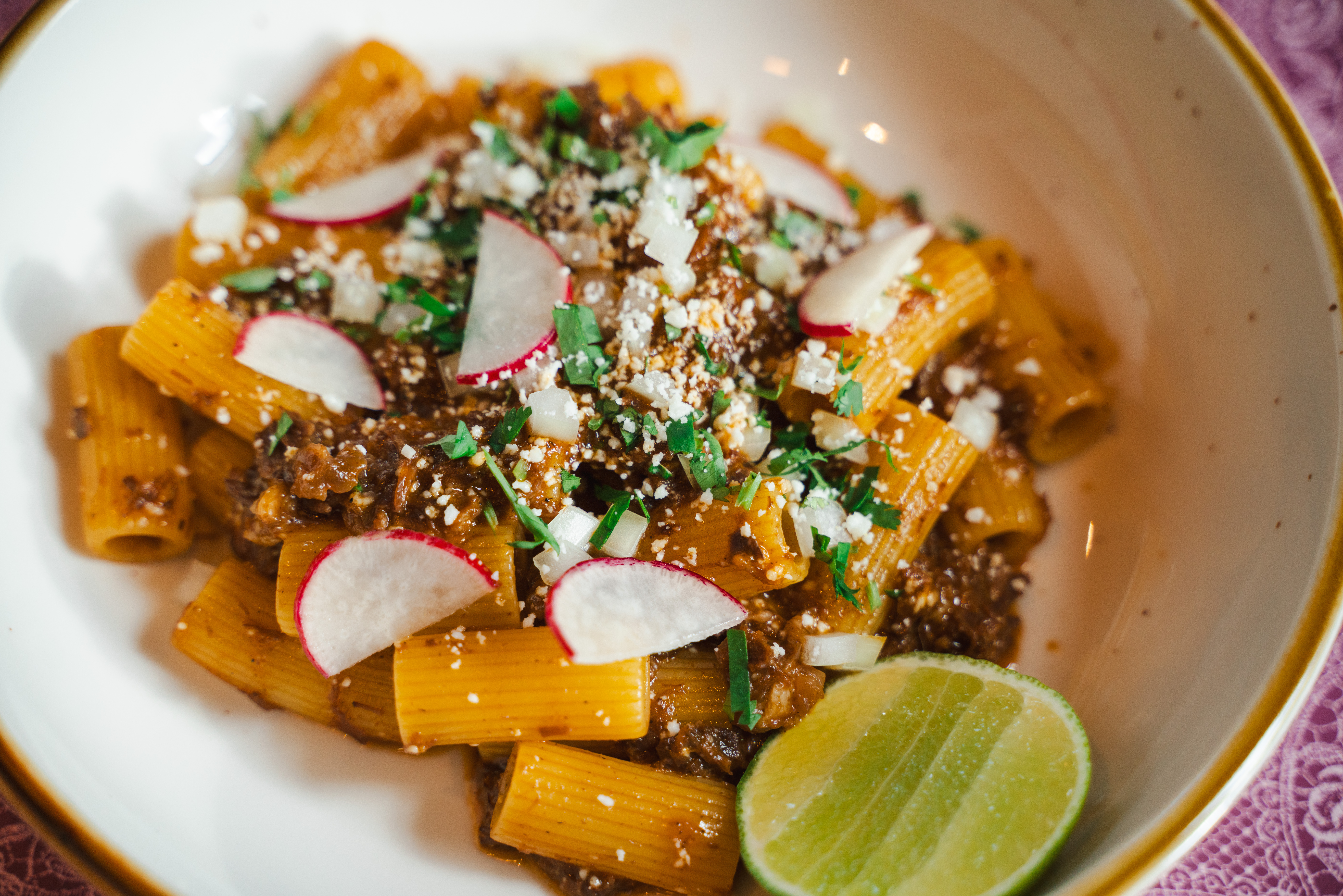 Beef Birria Mafaldine - Beef shank, rigatoni, cotija, adobo (Courtesy: Feed Media)