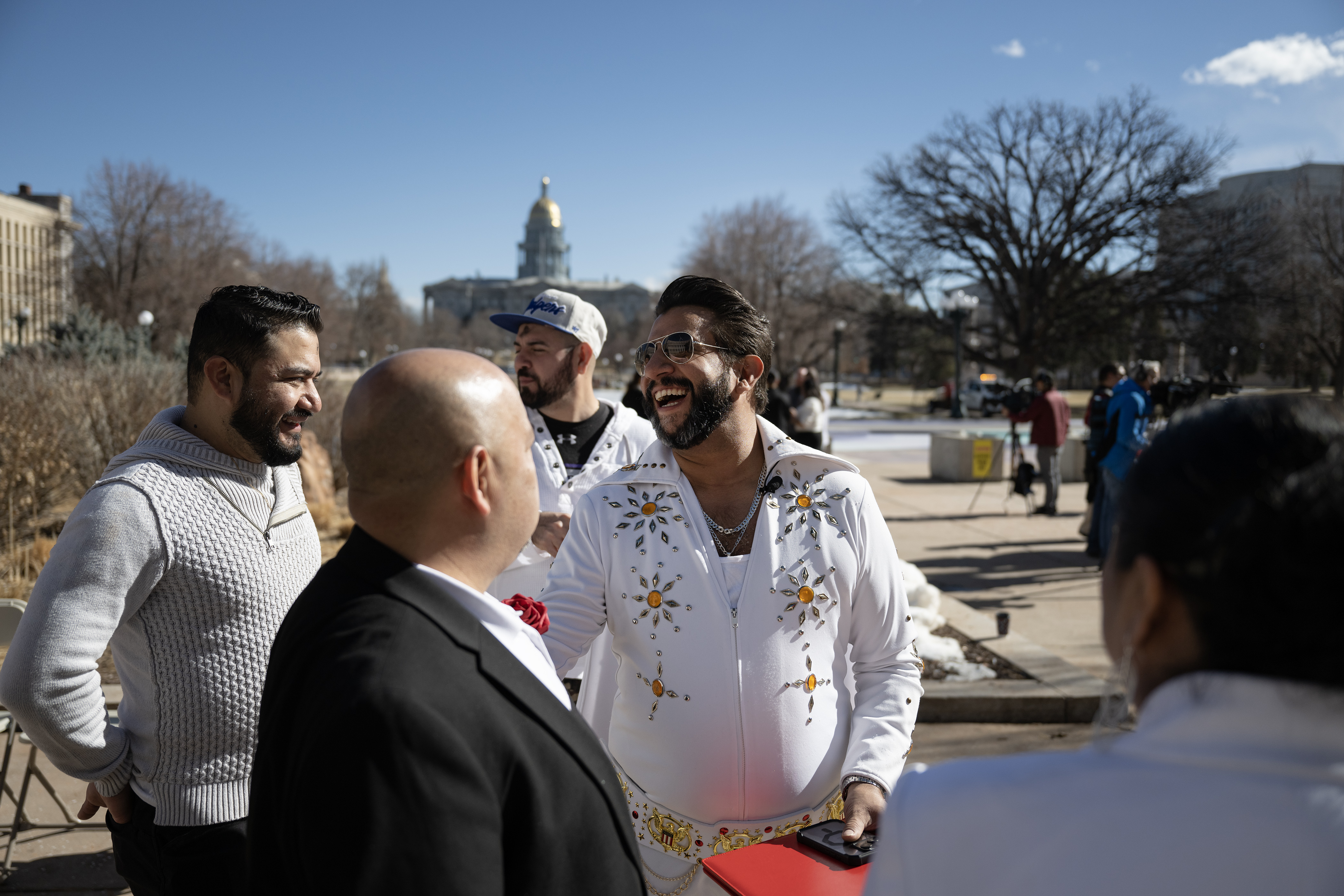 Denver Clerk and Recorder Paul López, dressed as Elvis Presley for the occasion, laugh with newlyweds Pedro Torres Guevara and Eudocia Romero Cabrera after their wedding outside the Denver City and County Building during the 16th annual Marriage Marathon on Wednesday, Feb. 14, 2024, in Denver, Colo. (Timothy Hurst/Denver Gazette) (TimHursttim.hurst@gazette.comhttps://secure.gravatar.com/avatar/aca82bd62b4ee425c598527cd6faa1b1?d=mm&r=g)