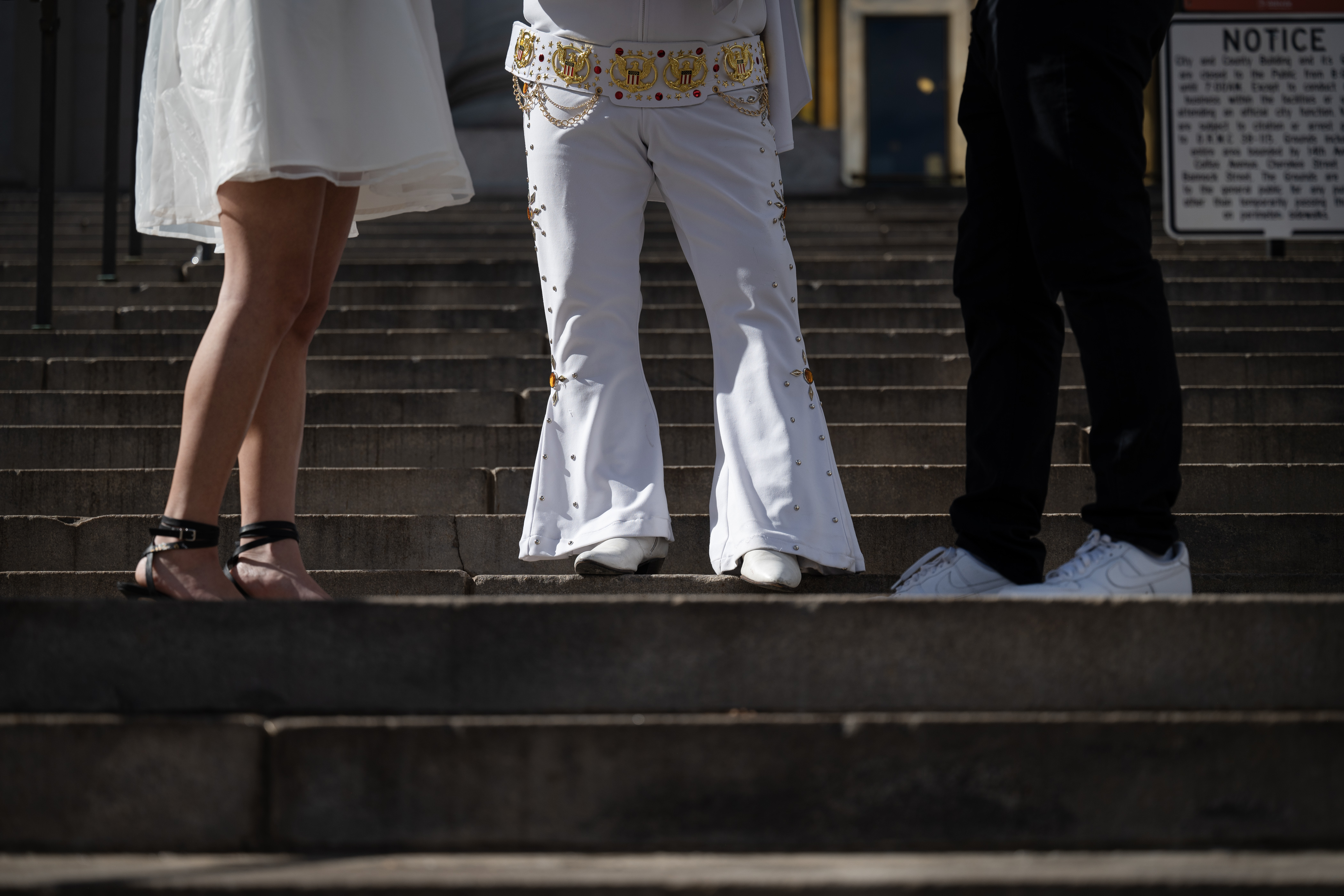 Denver Clerk and Recorder Paul López, dressed as Elvis Presley for the occasion, officiates the wedding of Ingrid, left, and Osama Zayed on the steps of the Denver City and County Building during the 16th annual Marriage Marathon on Wednesday, Feb. 14, 2024, in Denver, Colo. (Timothy Hurst/Denver Gazette) (TimHursttim.hurst@gazette.comhttps://secure.gravatar.com/avatar/aca82bd62b4ee425c598527cd6faa1b1?d=mm&r=g)