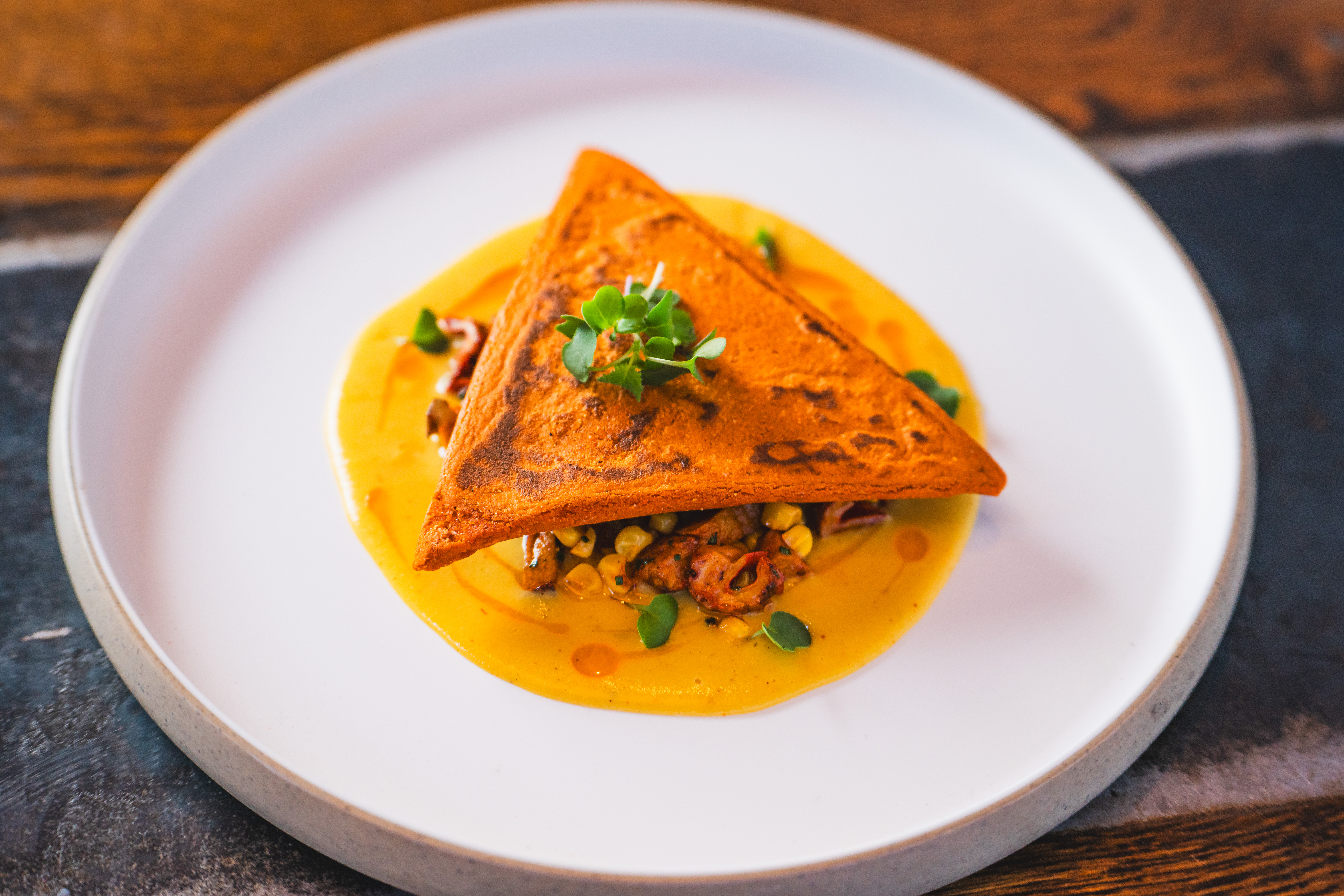 Lobster Tetela - Smoked lobster, Chihuahua cheese, corn, mushrooms, adobo (Courtesy: Feed Media)