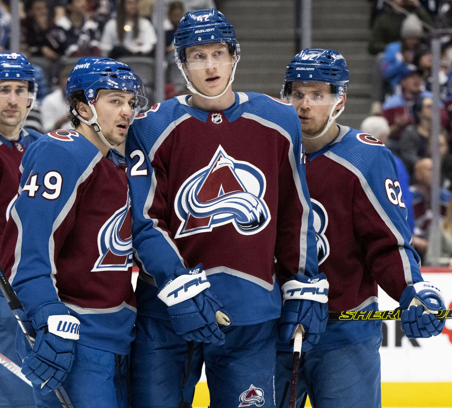 Colorado Avalanche defensemen Josh Manson (42), Samuel Girard (49) and left wing Artturi Lehkonen (62)talk things over before a faceoff during the second period against the Vancouver Canucks Tuesday, Feb. 20, 2024, at Ball Arena in Denver. (The Gazette, Christian Murdock) (Christian Murdock/The Gazette)