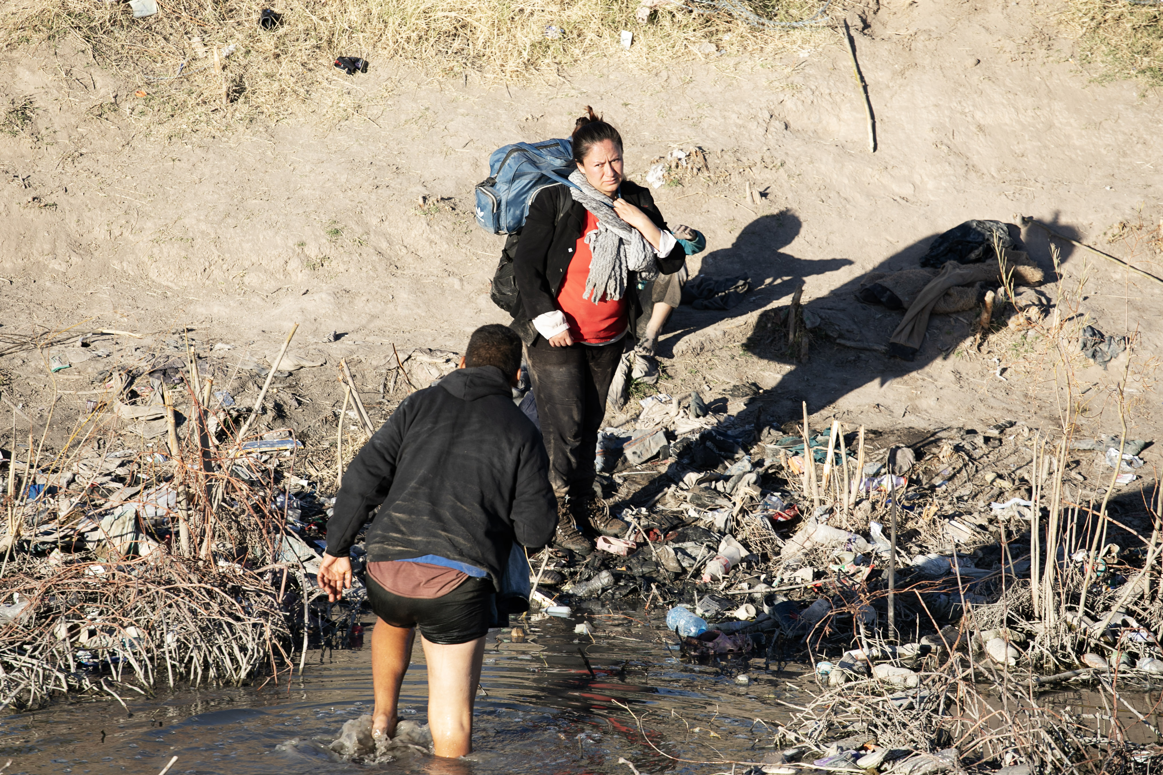 Immigrants regroup after wading across the Rio Grande River just south of El Paso Texas on Thursday, Feb. 1, 2024. (TomHellauerMultimedia Producertom.hellauer@denvergazette.comhttps://denvergazette.com/content/tncms/avatars/f/9e/622/f9e6228a-3b6b-11ed-bf10-fbb71fa8e421.f54b911252c540f1d61709edc4727a39.png)