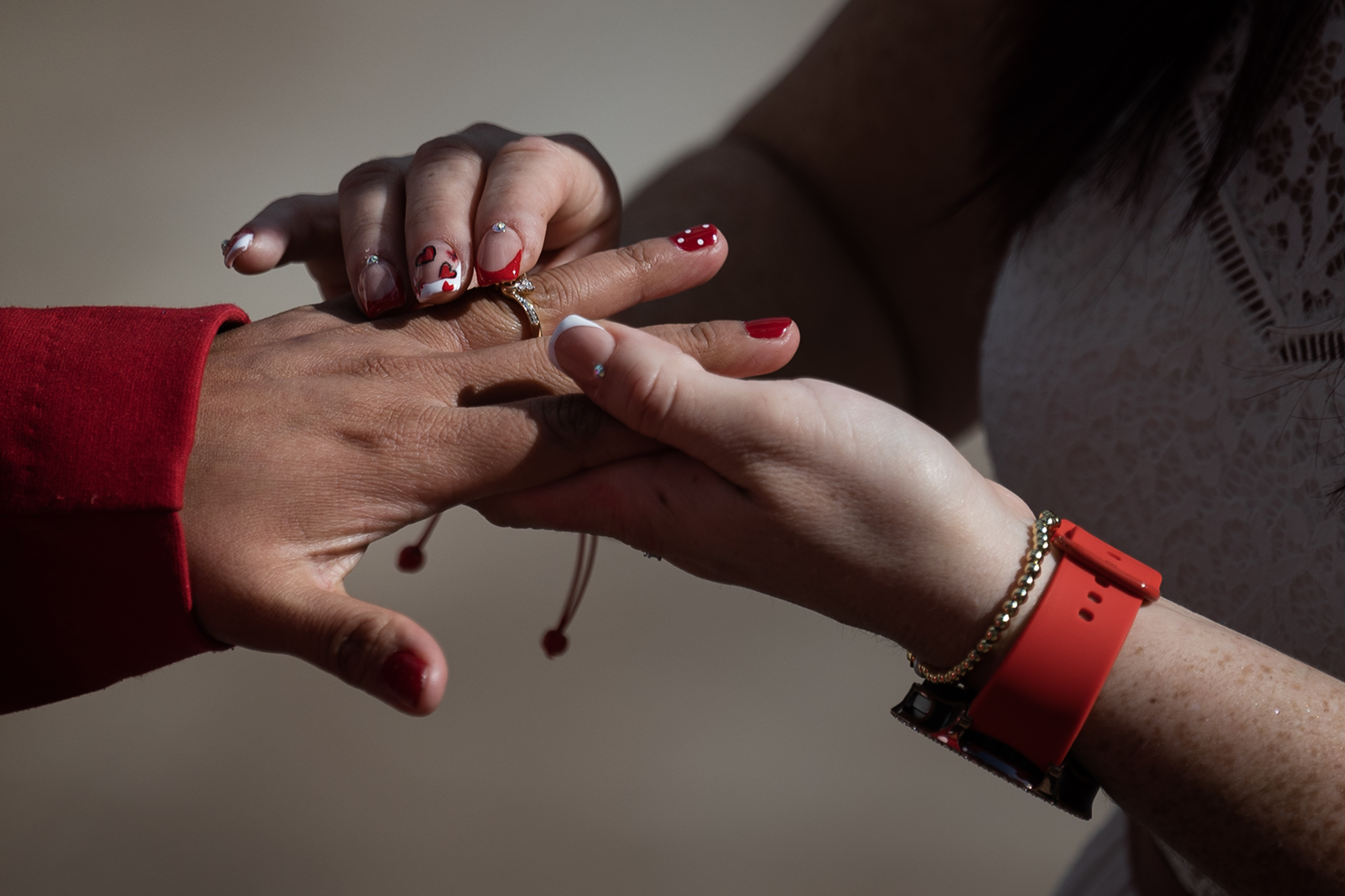 Mary Reyes, right, slips the ring son the finger of her newlywed wife Maricendi Jaimes during their wedding ceremony on the steps of the Denver City and County Building during the 16th annual Marriage Marathon on Wednesday, Feb. 14, 2024, in Denver, Colo. (Timothy Hurst/Denver Gazette) (TimHursttim.hurst@gazette.comhttps://secure.gravatar.com/avatar/aca82bd62b4ee425c598527cd6faa1b1?d=mm&r=g)