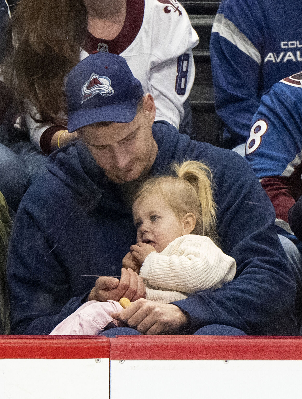 Nuggets MVP center Nikola Jokec plays with his daughter, Ognjena, 2, during the second period of the Colorado Avalanche game against the Vancouver Canucks Tuesday, Feb. 20, 2024, at Ball Arena in Denver. (The Gazette, Christian Murdock) (Christian Murdock/The Gazette)