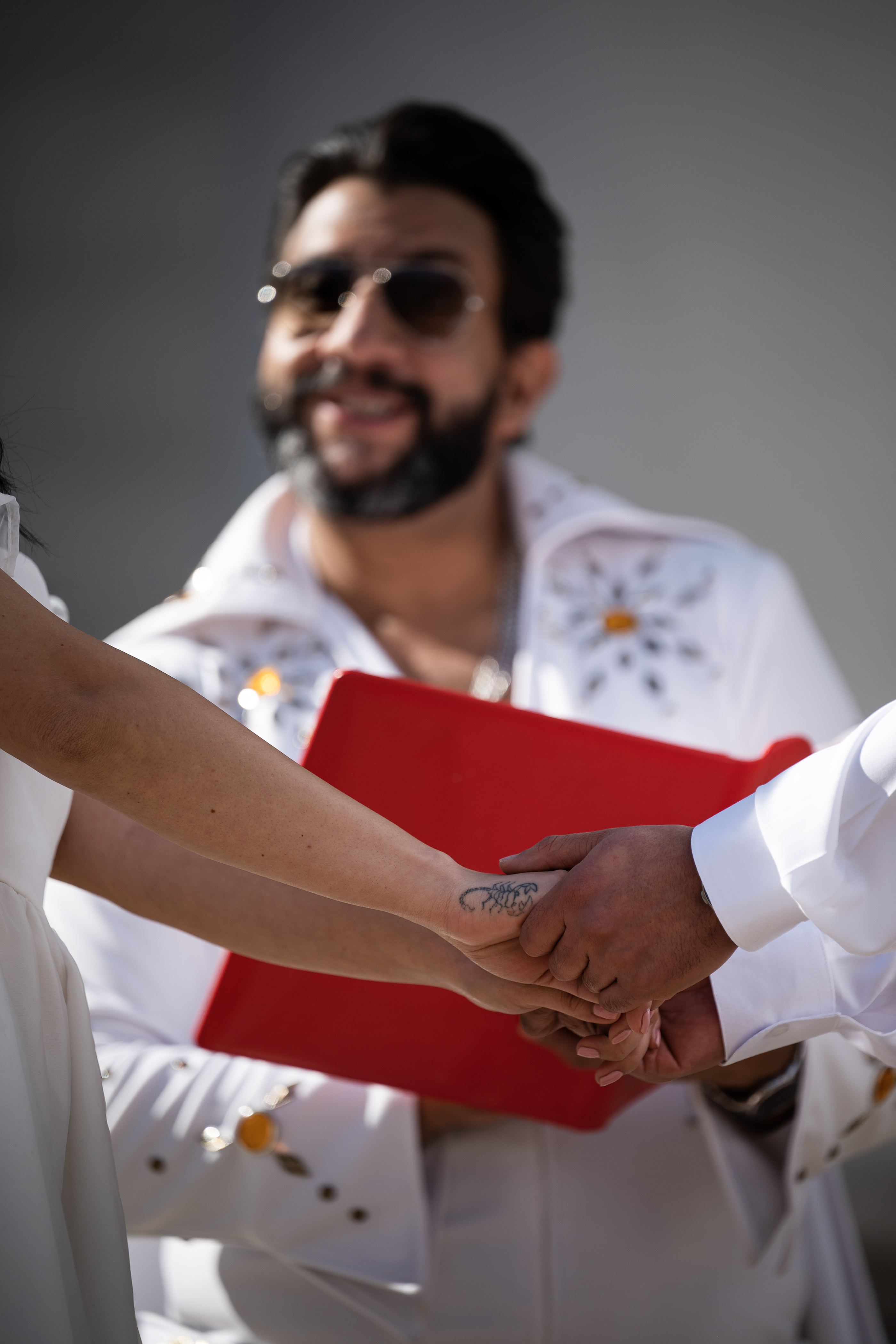 Denver Clerk and Recorder Paul López, dressed as Elvis Presley for the occasion, officiates the wedding of Ingrid, left, and Osama Zayed on the steps of the Denver City and County Building during the 16th annual Marriage Marathon on Wednesday, Feb. 14, 2024, in Denver, Colo. (Timothy Hurst/Denver Gazette) (TimHursttim.hurst@gazette.comhttps://secure.gravatar.com/avatar/aca82bd62b4ee425c598527cd6faa1b1?d=mm&r=g)