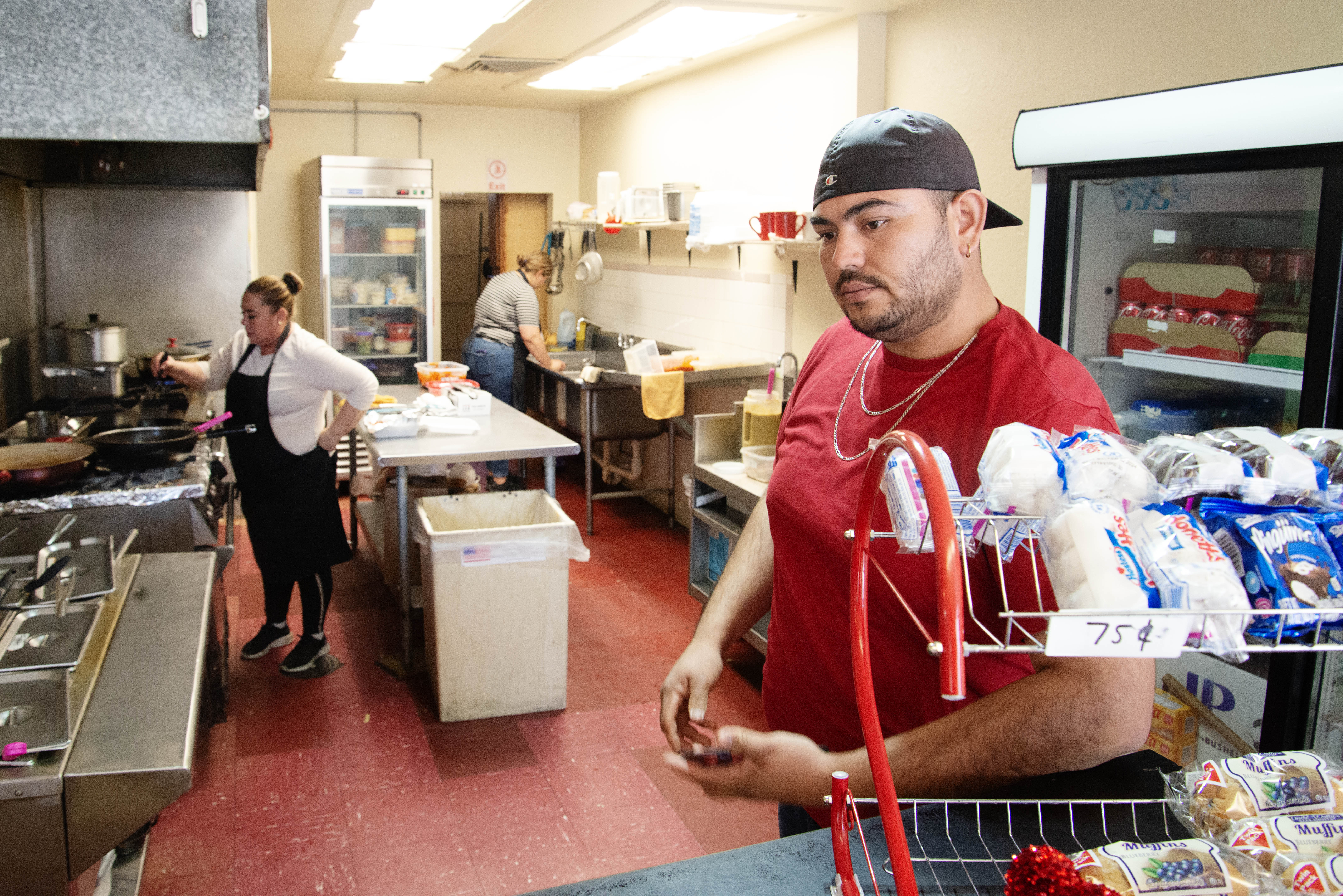 Oscar Perea, right, and his mother, Maria Perea, left, respectively manage and own a restaurant near one of El Paso's largest immigrant shelters as seen on Wednesday, Jan. 31, 2024. The pair told the Denver Gazette while they and the first Venezuelan arrivals they encountered shared some culture shock, they have come to thrive with frequent business and support from the immigrant community, even going as far to serve more Venezuelan cuisine to appeal to them more. (TomHellauerMultimedia Producertom.hellauer@denvergazette.comhttps://denvergazette.com/content/tncms/avatars/f/9e/622/f9e6228a-3b6b-11ed-bf10-fbb71fa8e421.f54b911252c540f1d61709edc4727a39.png)