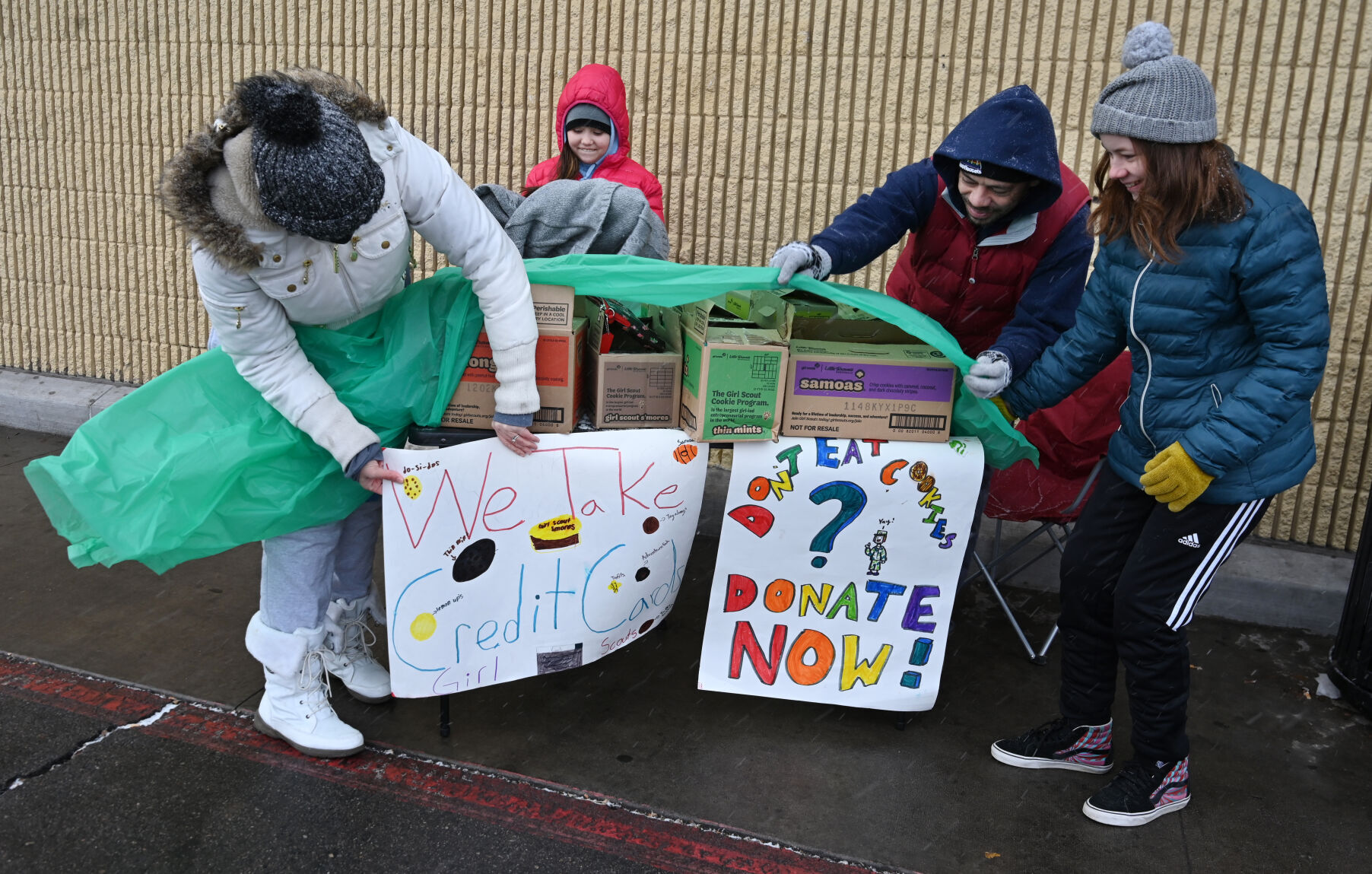 Girl Scouts set up their cookie sale stand at grocery store on Austin Bluffs Parkway in 2022. (Jerilee Bennett/The Gazette)