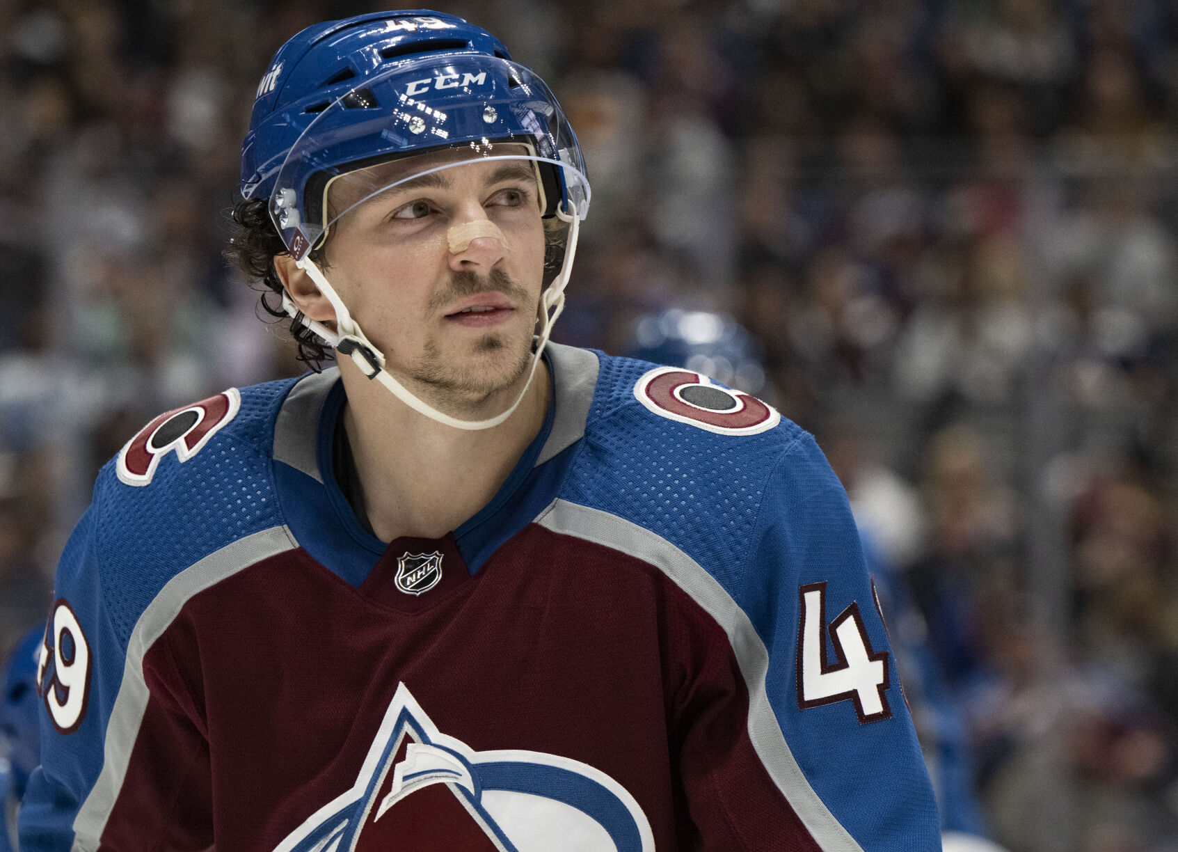 Colorado Avalanche defenseman Samuel Girard (49) prepares for a faceoff against the Vancouver Canucks during the second period Tuesday, Feb. 20, 2024, at Ball Arena in Denver. (The Gazette, Christian Murdock) (Christian Murdock/The Gazette)