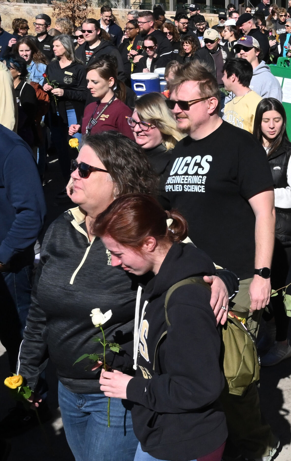 Hundreds start out on a Healing Walk at UCCS on Monday, Feb. 19, 2024. Two people were found dead in a dorm last Friday of apparent gunshot wounds. A suspect was arrested Monday. Also, a student suddenly died from a medical issue several days before the murders. (Photo by Jerilee Bennett, The Gazette)