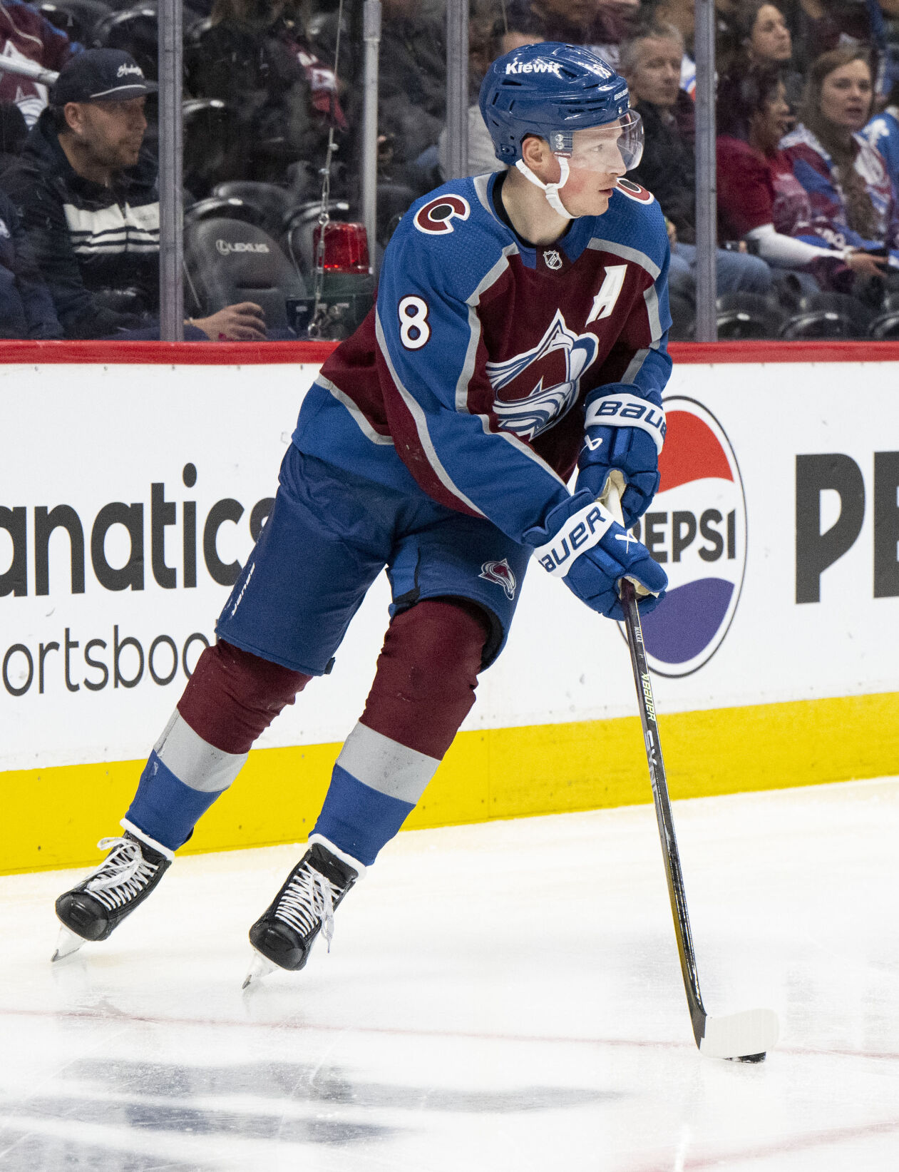 Colorado Avalanche defenseman Cale Makar (8) moves the puck behind the goal during the second period against the Vancouver Canucks Tuesday, Feb. 20, 2024, at Ball Arena in Denver. (The Gazette, Christian Murdock) (Christian Murdock/The Gazette)