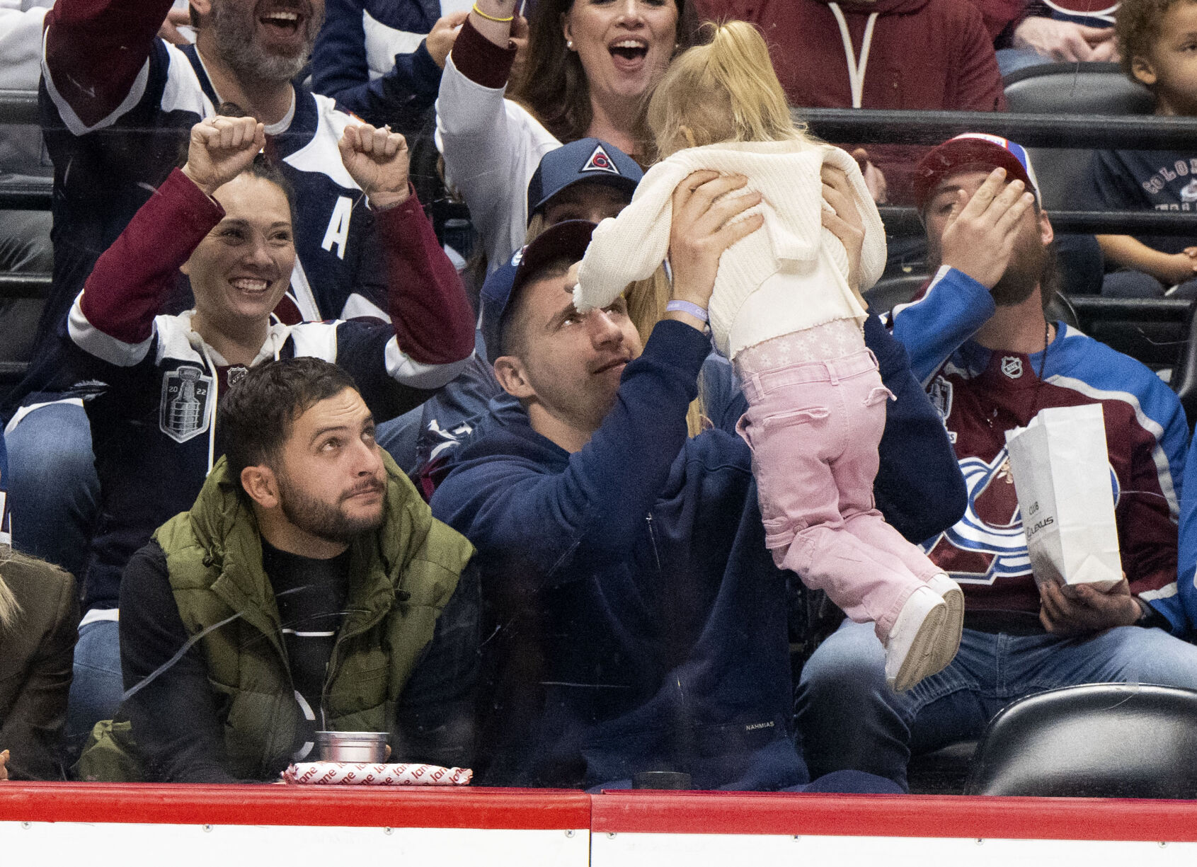 Nuggets MVP center Nikola Jokec plays with his daughter, Ognjena, 2, during the second period of the Colorado Avalanche game against the Vancouver Canucks Tuesday, Feb. 20, 2024, at Ball Arena in Denver. (The Gazette, Christian Murdock) (Christian Murdock/The Gazette)
