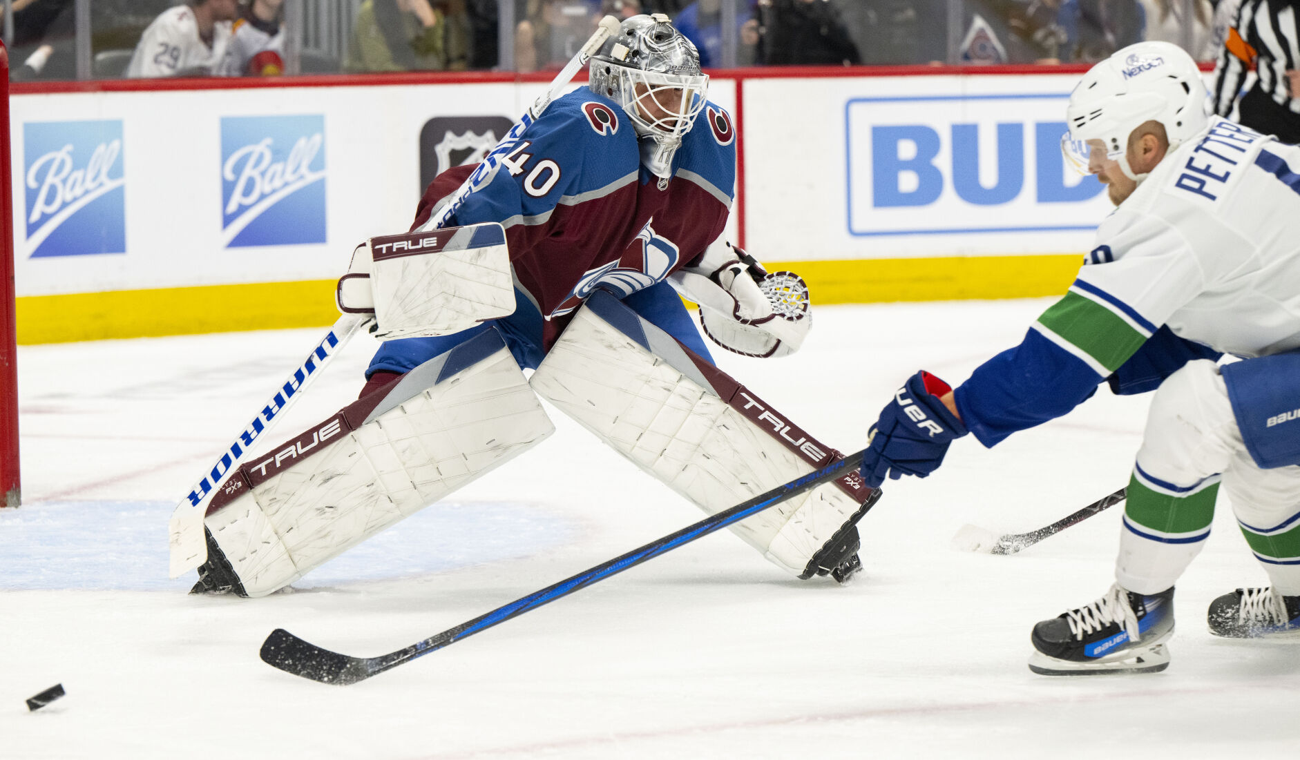 Colorado Avalanche goaltender Alexandar Georgiev (40) defends the goal against Vancouver Canucks center Elias Pettersson (40) during the second period Tuesday, Feb. 20, 2024, at Ball Arena in Denver. (The Gazette, Christian Murdock) (Christian Murdock/The Gazette)