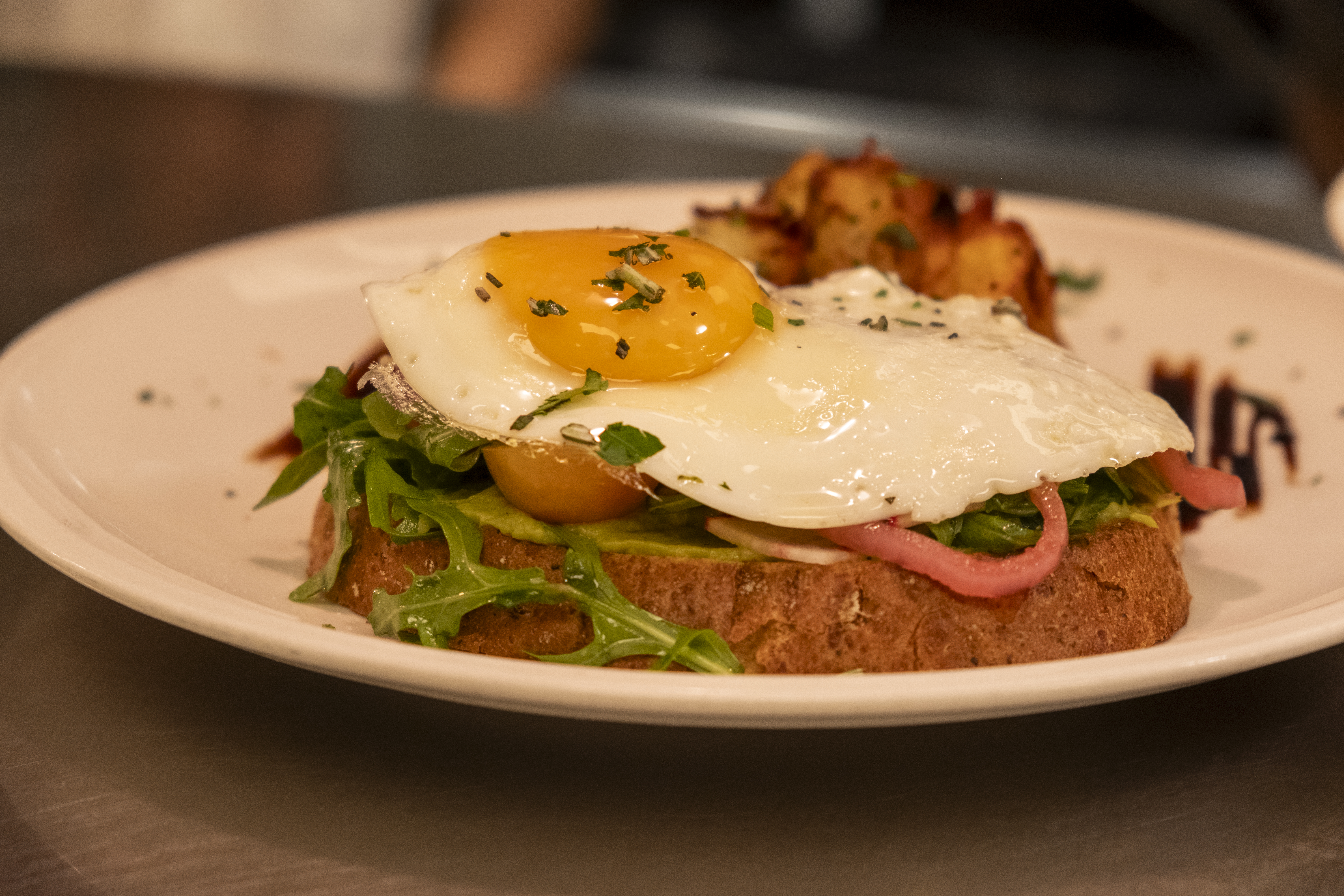 Avocado Toast sits in the serving window of the kitchen at Apple Blossom Thursday, Feb. 15, 2024 at the Hyatt Centric Downtown Denver in Denver, Colorado. Chef Adrian Faison is the executive chef at the newly reopened restaurant and is bringing southern style foods to the popular eatery. (JonathanIngrahamDigital Strategistjonathan.ingraham@denvergazette.comhttps://denvergazette.com/content/tncms/avatars/c/dd/7f0/cdd7f086-b693-11ec-b373-bba598953eb6.fc0f5608a6f1144f64f080f771bd904d.png)