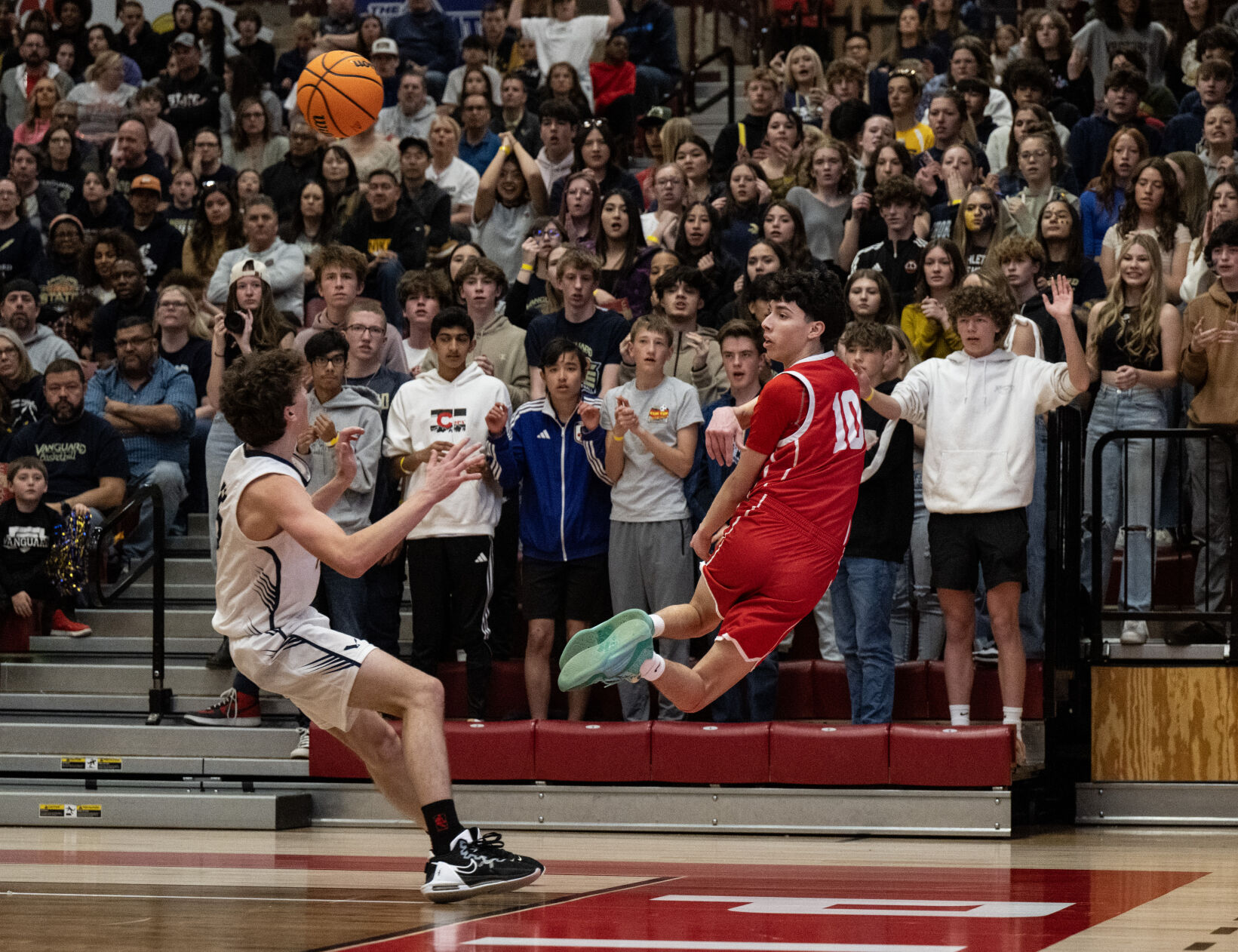 Yuma’s Edwin Munoz (10) flies through the air as he tosses the ball in bounds in the second half of the 3A boys basketball state championships against Vanguard on Saturday, March 9, 2024, at the University of Denver’s Hamilton Gym in Denver. (Parker Seibold, The Gazette) (Parker Seibold)
