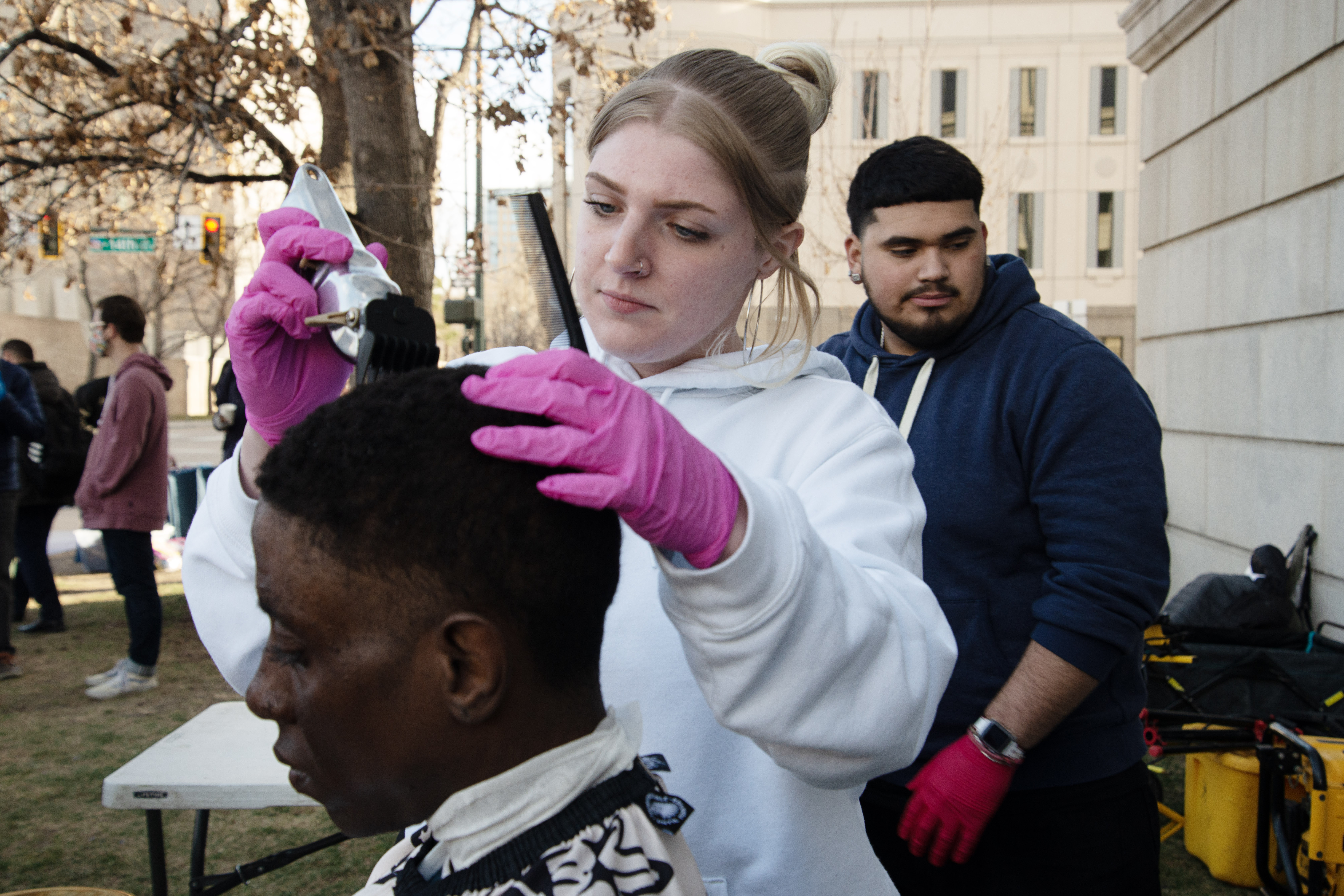 Mickie Reynolds, center, cuts Kevin Campbell's hair at Mutual Aid Monday on March 4, 2024. Free haircuts are among the services and essential items provided at the weekly volunteer event. Since the event's start about three years ago, volunteers have not missed a week. (TomHellauerMultimedia Producertom.hellauer@denvergazette.comhttps://denvergazette.com/content/tncms/avatars/f/9e/622/f9e6228a-3b6b-11ed-bf10-fbb71fa8e421.f54b911252c540f1d61709edc4727a39.png)