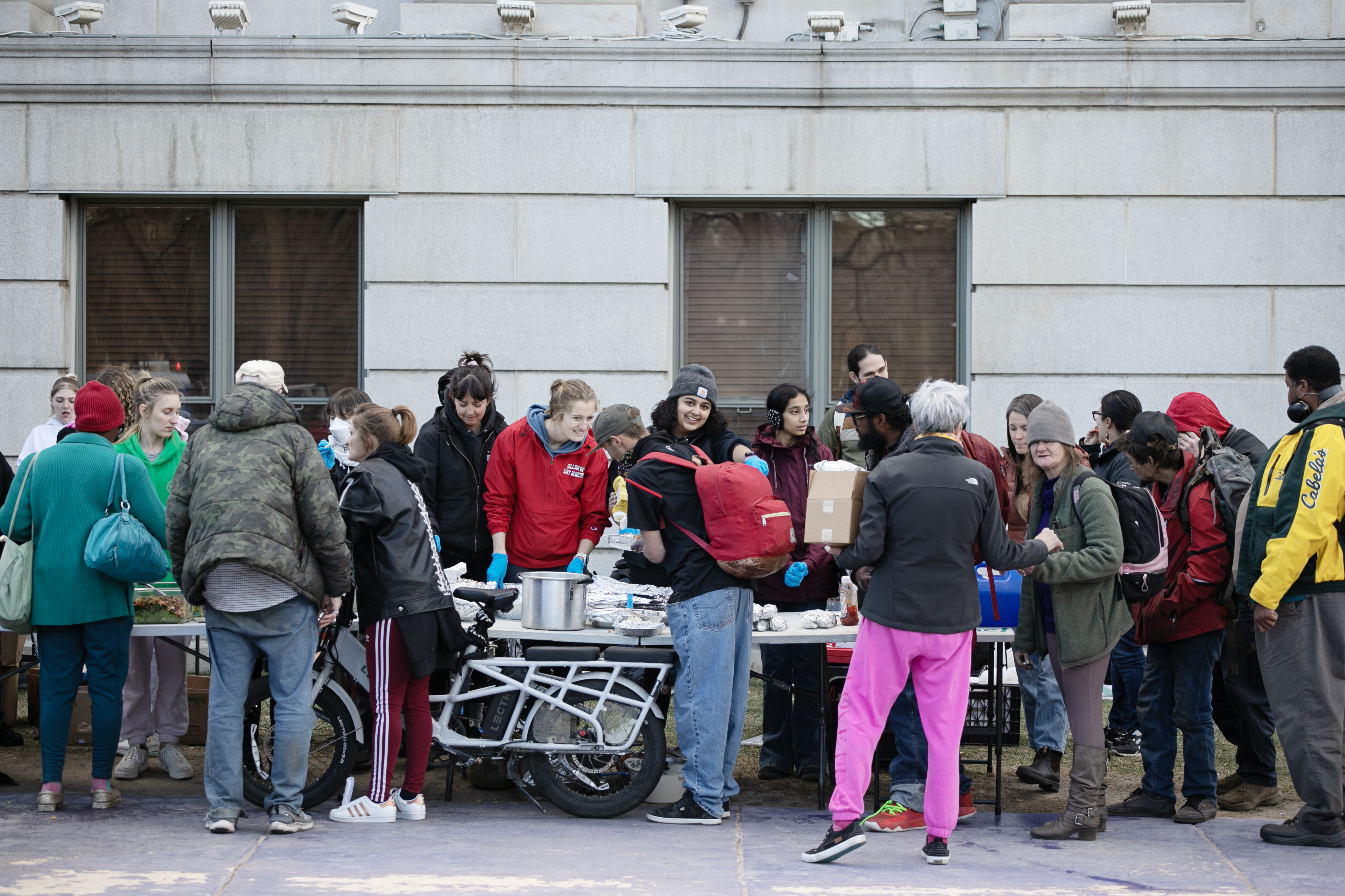 FILE PHOTO: Volunteers with Mutual Aid Monday pass out food, hygiene items, clothing and more to homeless people and immigrants just outside the Denver City and County Building on Monday, March 4, 2024. The Denver Clerk and Recorder had a booth to help facilitate voter turnout there, as well. (TomHellauerMultimedia Producertom.hellauer@denvergazette.comhttps://denvergazette.com/content/tncms/avatars/f/9e/622/f9e6228a-3b6b-11ed-bf10-fbb71fa8e421.f54b911252c540f1d61709edc4727a39.png)