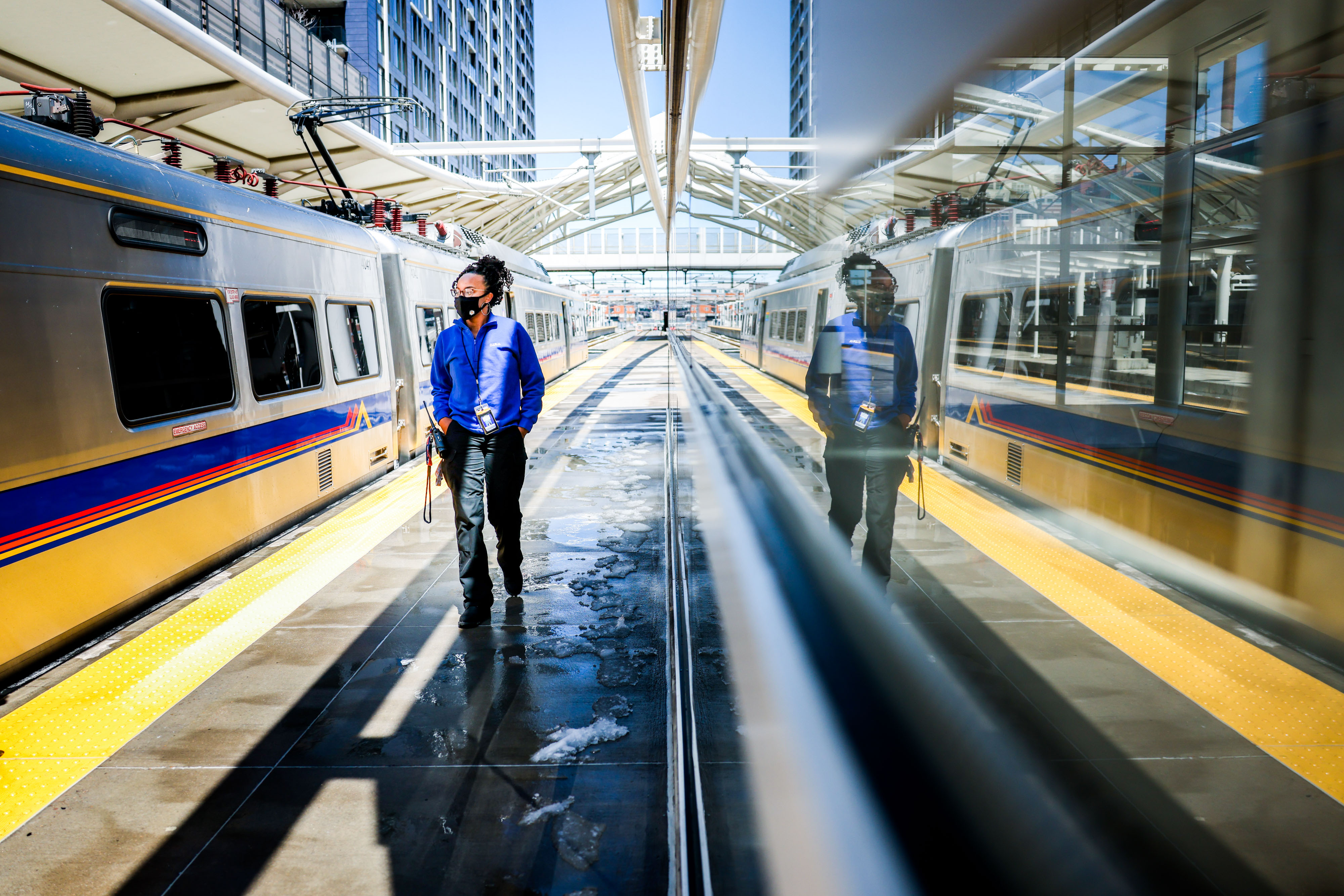 FILE PHOTO: Danielle Jones, RTD’s lead contracted mental health clinician, walks around the platform at Union Station on Tuesday, April 20, 2021 in Denver. Jones, a Mental Health Center of Denver psychiatric rehabilitation practitioner, works with RTD Transit Police Division to contact passengers in Denver who may need mental health support. (Michael Ciaglo/Special to The Denver Gazette)