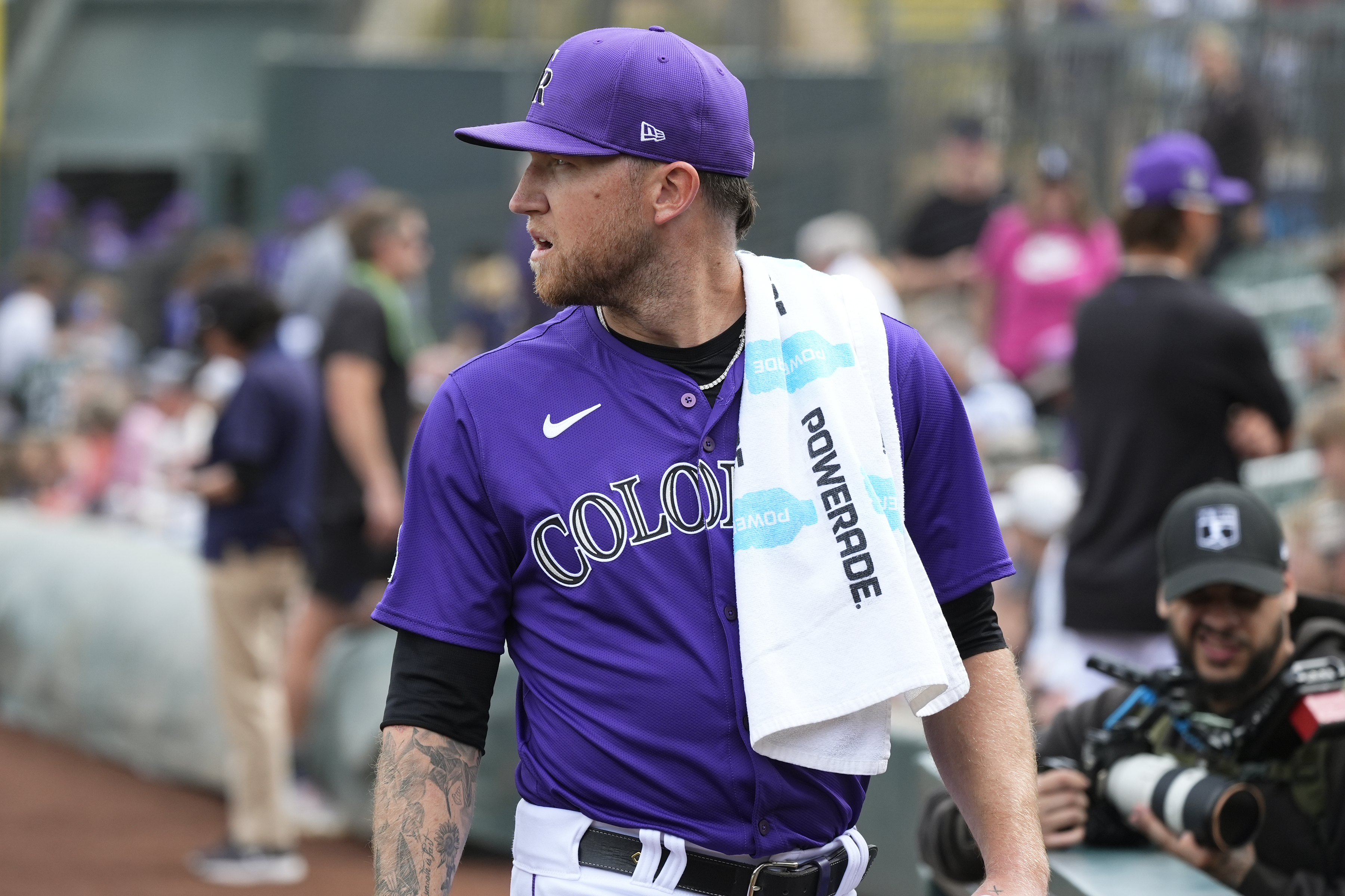 Colorado Rockies starting pitcher Kyle Freeland walks to the dugout after warming up in the bullpen prior to a spring training baseball game against the Texas Rangers Wednesday, March 6, 2024, in Scottsdale, Ariz. (AP Photo/Ross D. Franklin) (Ross D. Franklin)