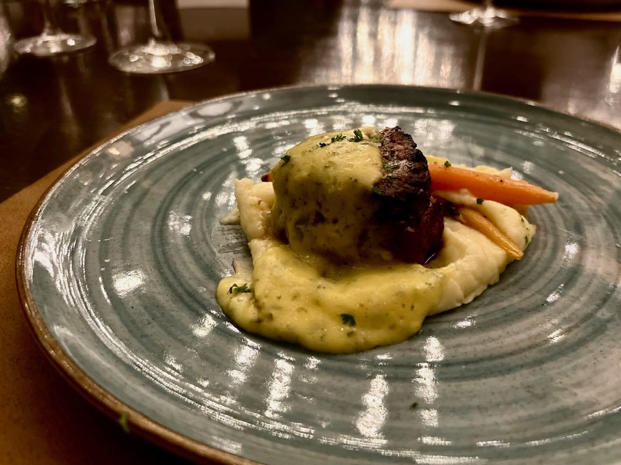 The Meyers All-Natural Prime Filet, featuring a truffle pommes puree, sautéed baby carrots, and sauce bearnaise. Photo Credit: Spencer McKee.