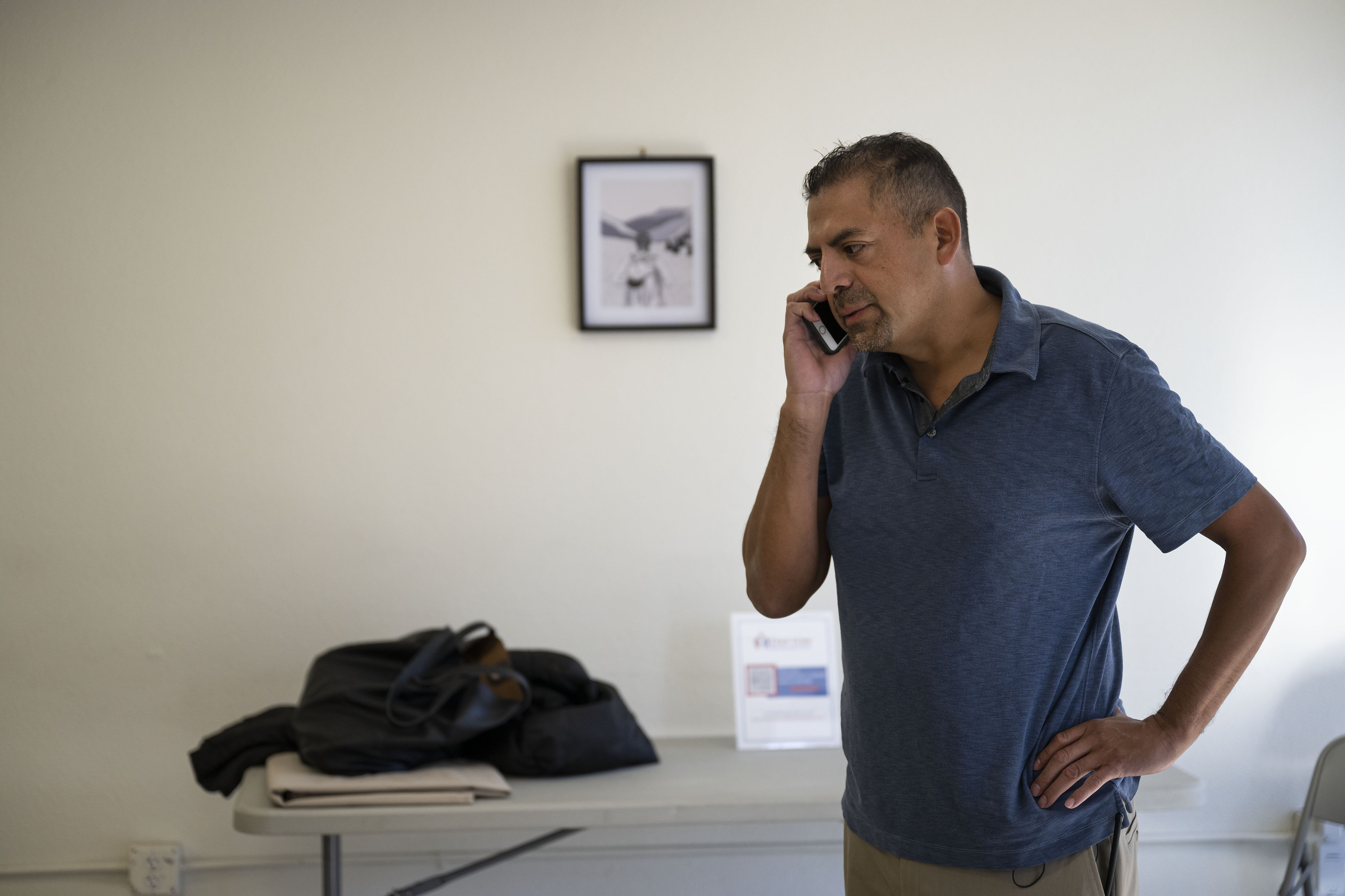 FILE PHOTO: Dayton Street Day Labor Center executive director Mateos Alvarez coordinates food truck service to a local temporary shelter set up for a migrants seeking asylum in the U.S. on Thursday, Dec. 8, 2022, at the center just off East Colfax Avenue in Aurora, Colo. (Timothy Hurst/The Gazette) (TimHursttim.hurst@gazette.comhttps://secure.gravatar.com/avatar/aca82bd62b4ee425c598527cd6faa1b1?d=mm&r=g)