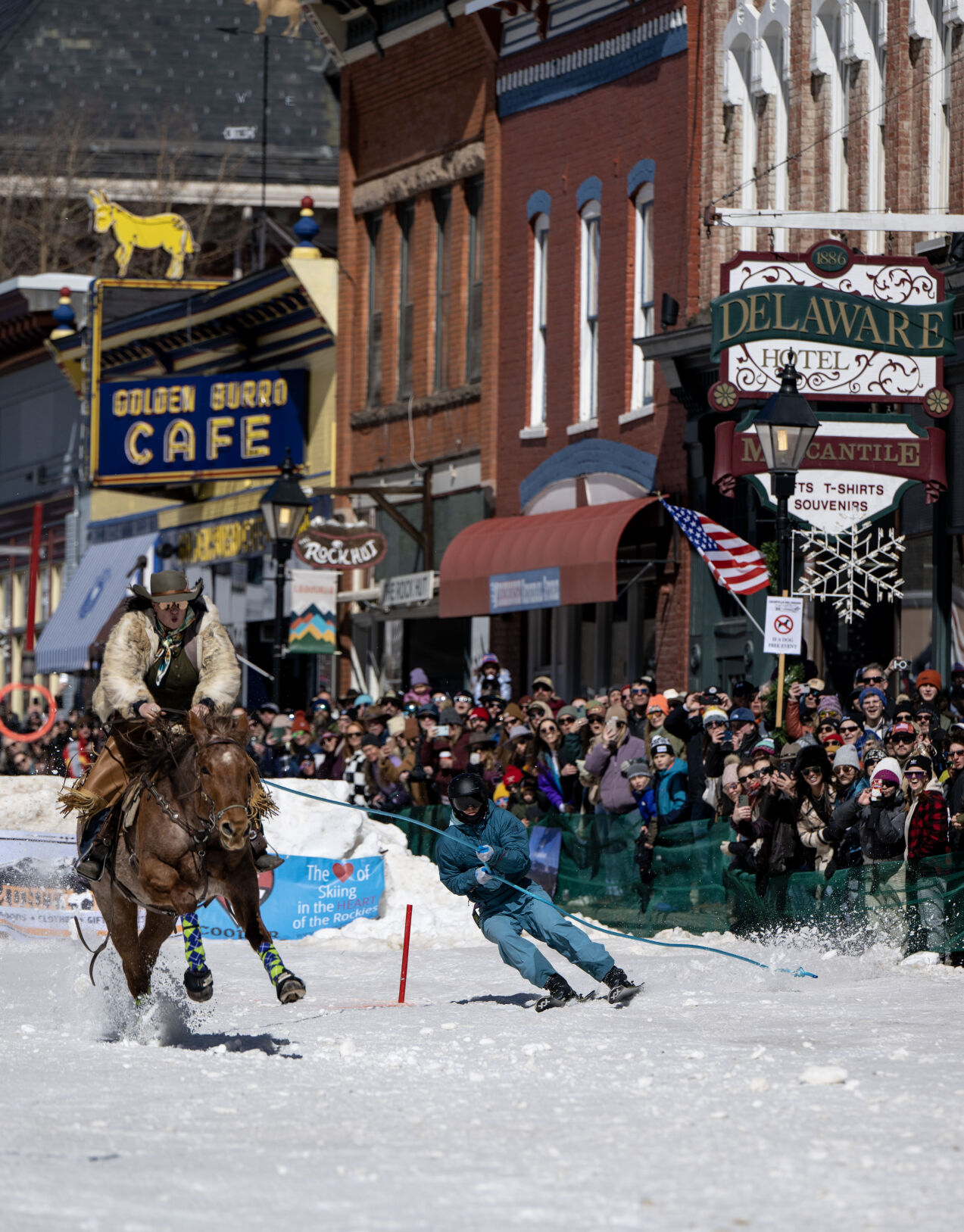 A horse and rider pull a skier through the course at the 76th Annual Leadville Ski Joring on Saturday, March 2, 2024, in Leadville, Colo. (Parker Seibold, The Gazette) (Parker Seibold)