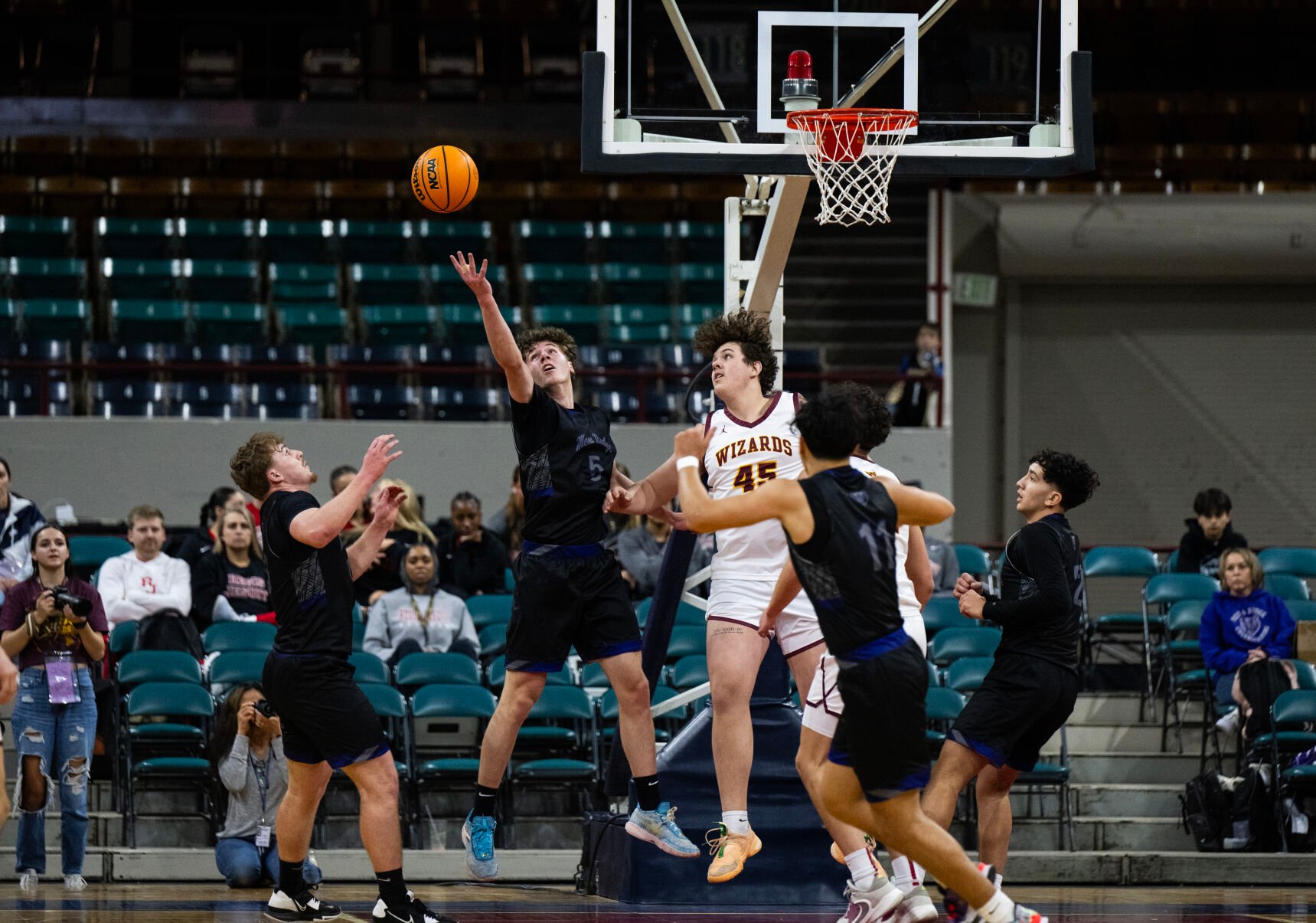The Mesa Ridge boys basketball team wins their second consecutive 5A boys basketball state championship over Windsor on Saturday, March 9, 2024, at the Denver Coliseum in Denver. The Grizzlies won 57-53. (Parker Seibold, The Gazette) (Parker Seibold)