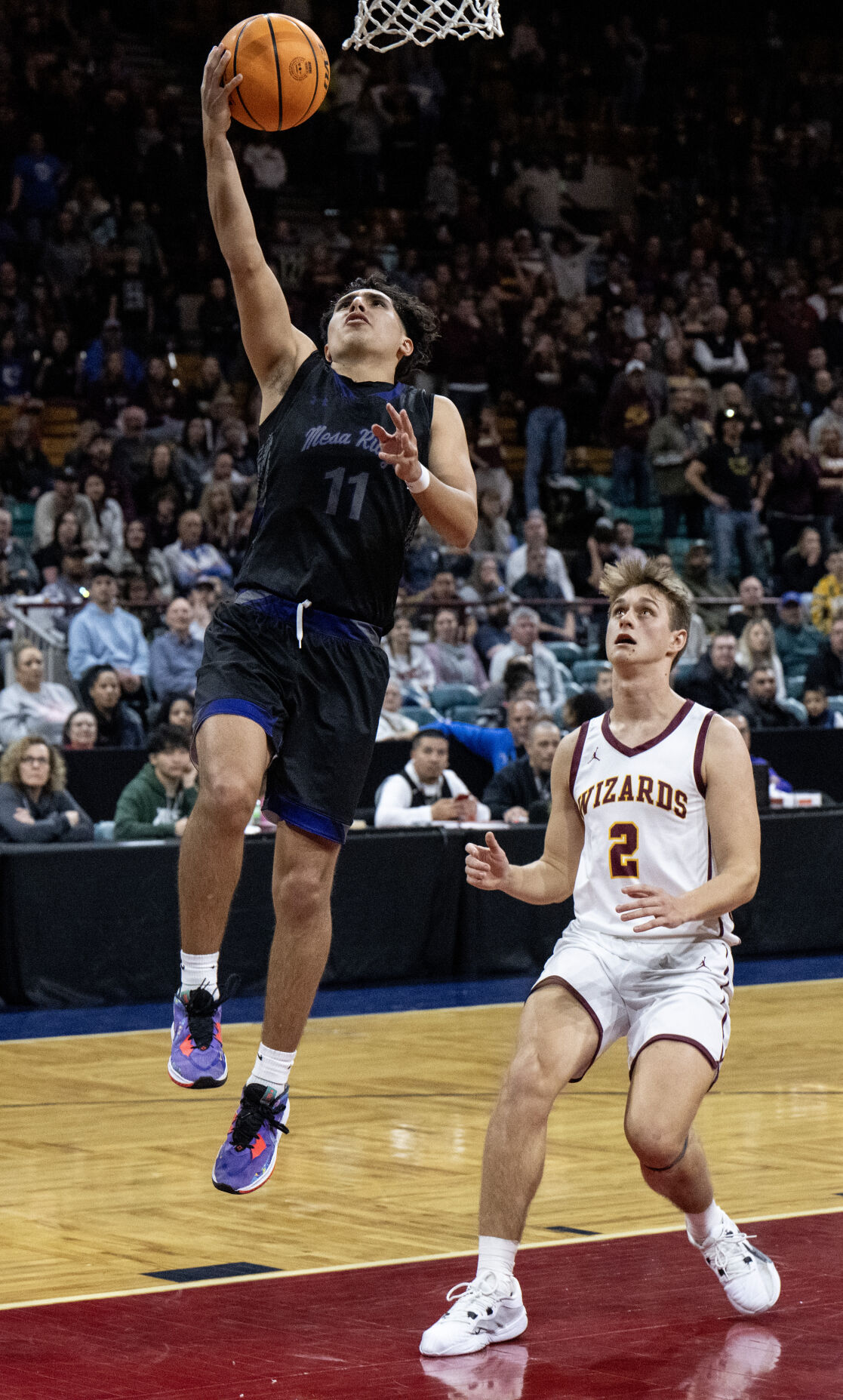 The Mesa Ridge boys basketball team wins their second consecutive 5A boys basketball state championship over Windsor on Saturday, March 9, 2024, at the Denver Coliseum in Denver. The Grizzlies won 57-53. (Parker Seibold, The Gazette) (Parker Seibold)
